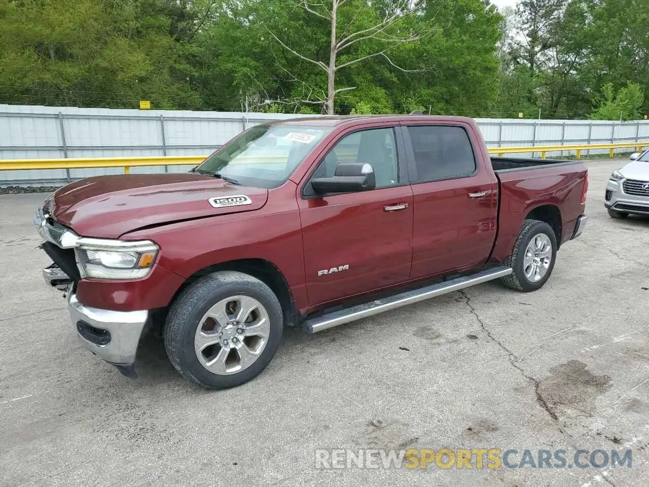 1 Photograph of a damaged car 1C6RREFT3KN509430 RAM 1500 2019