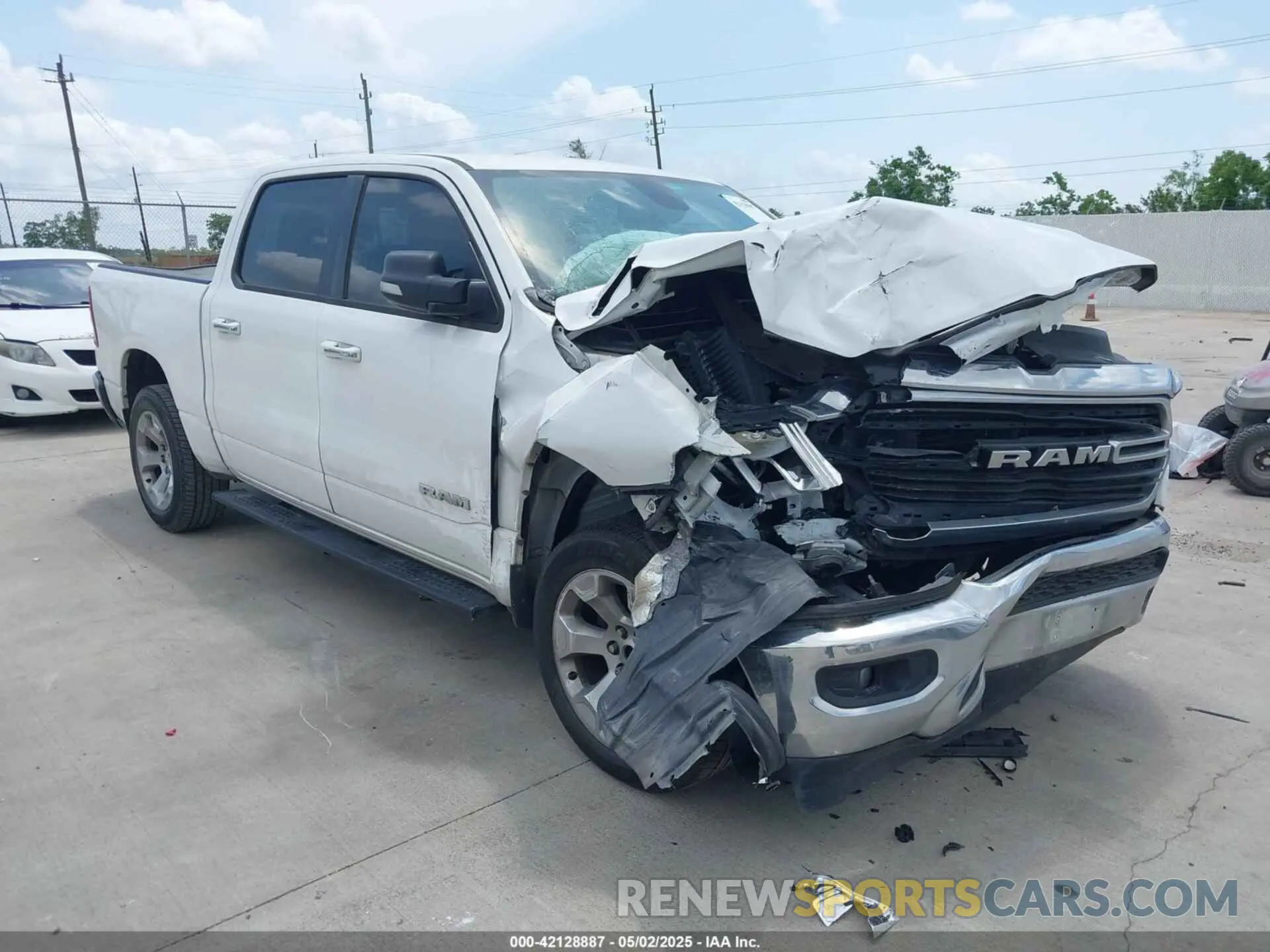 1 Photograph of a damaged car 1C6RREFT3KN581499 RAM 1500 2019