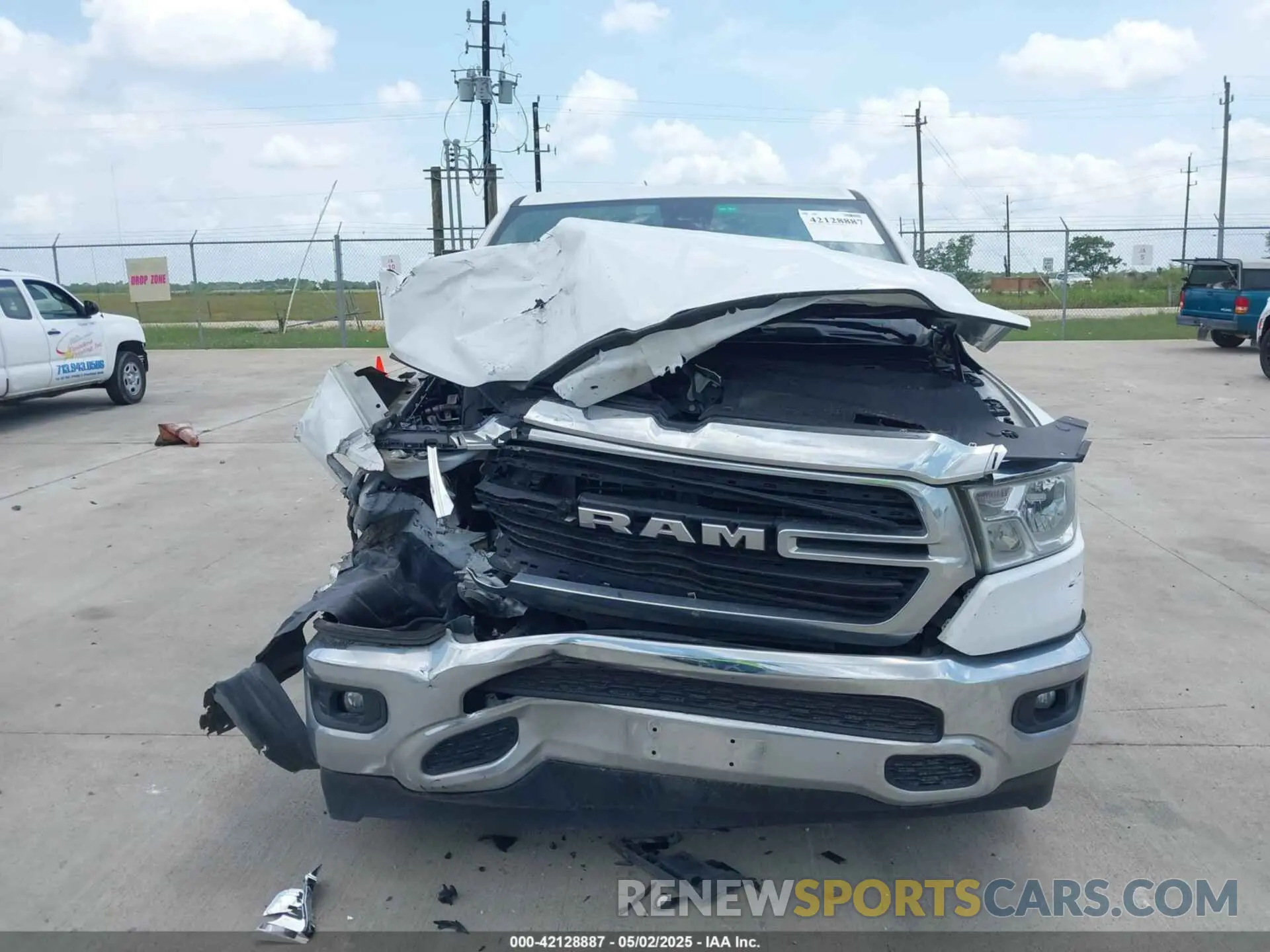 12 Photograph of a damaged car 1C6RREFT3KN581499 RAM 1500 2019