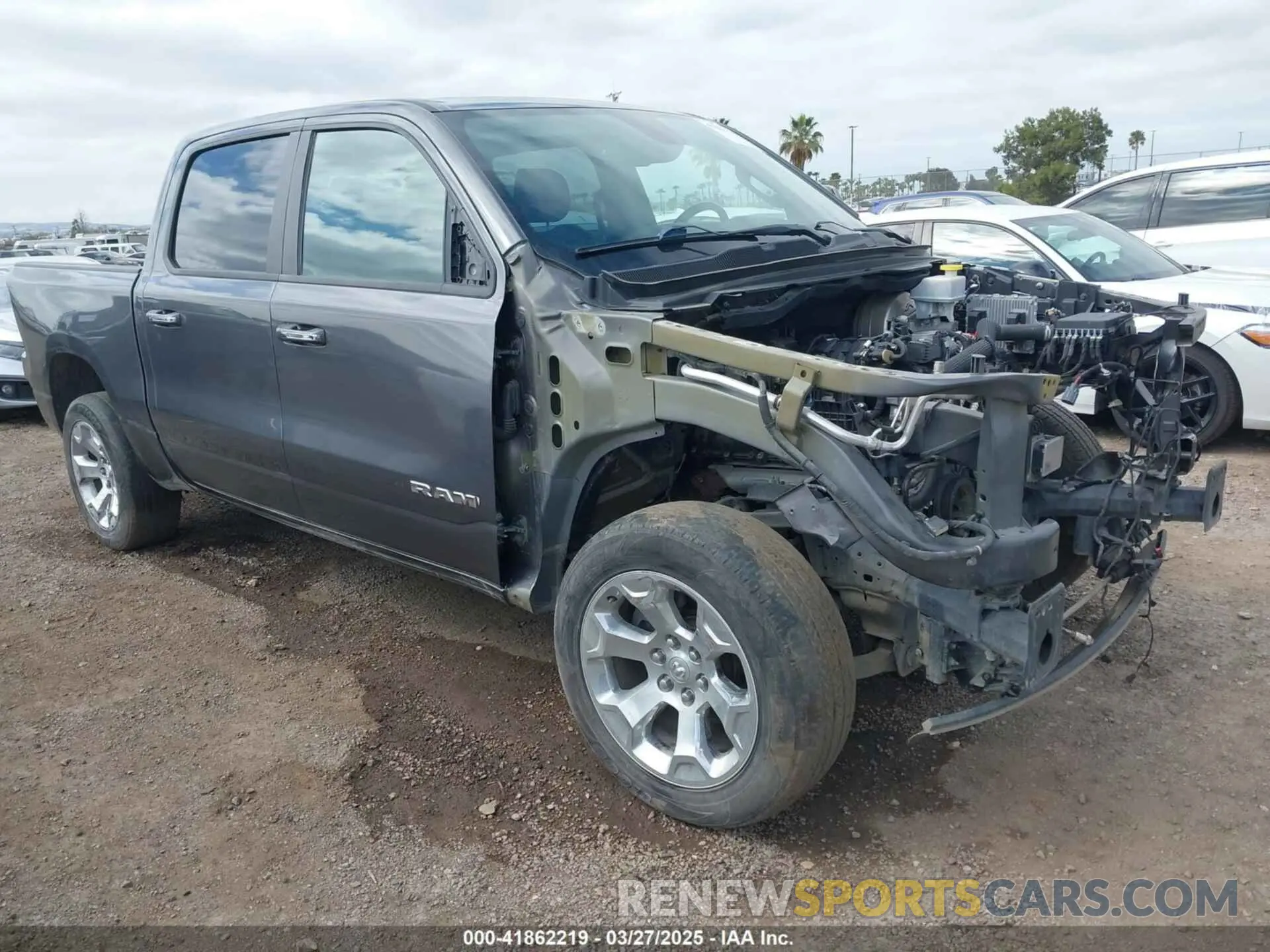 1 Photograph of a damaged car 1C6RREFT3KN601556 RAM 1500 2019