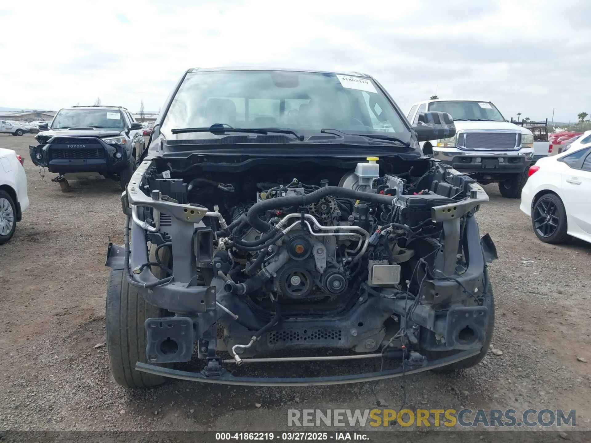 11 Photograph of a damaged car 1C6RREFT3KN601556 RAM 1500 2019