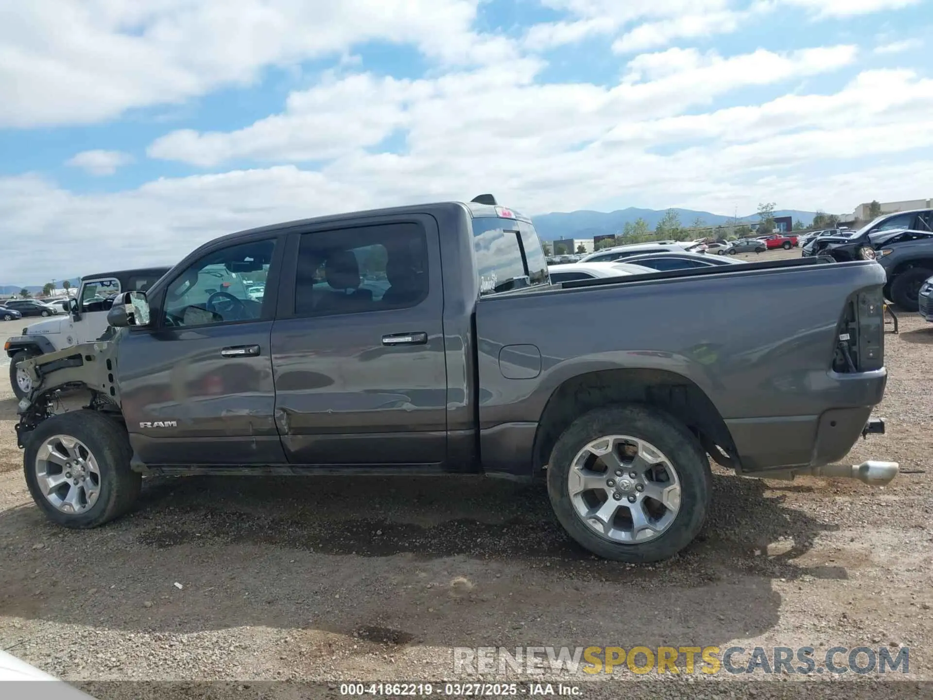 13 Photograph of a damaged car 1C6RREFT3KN601556 RAM 1500 2019