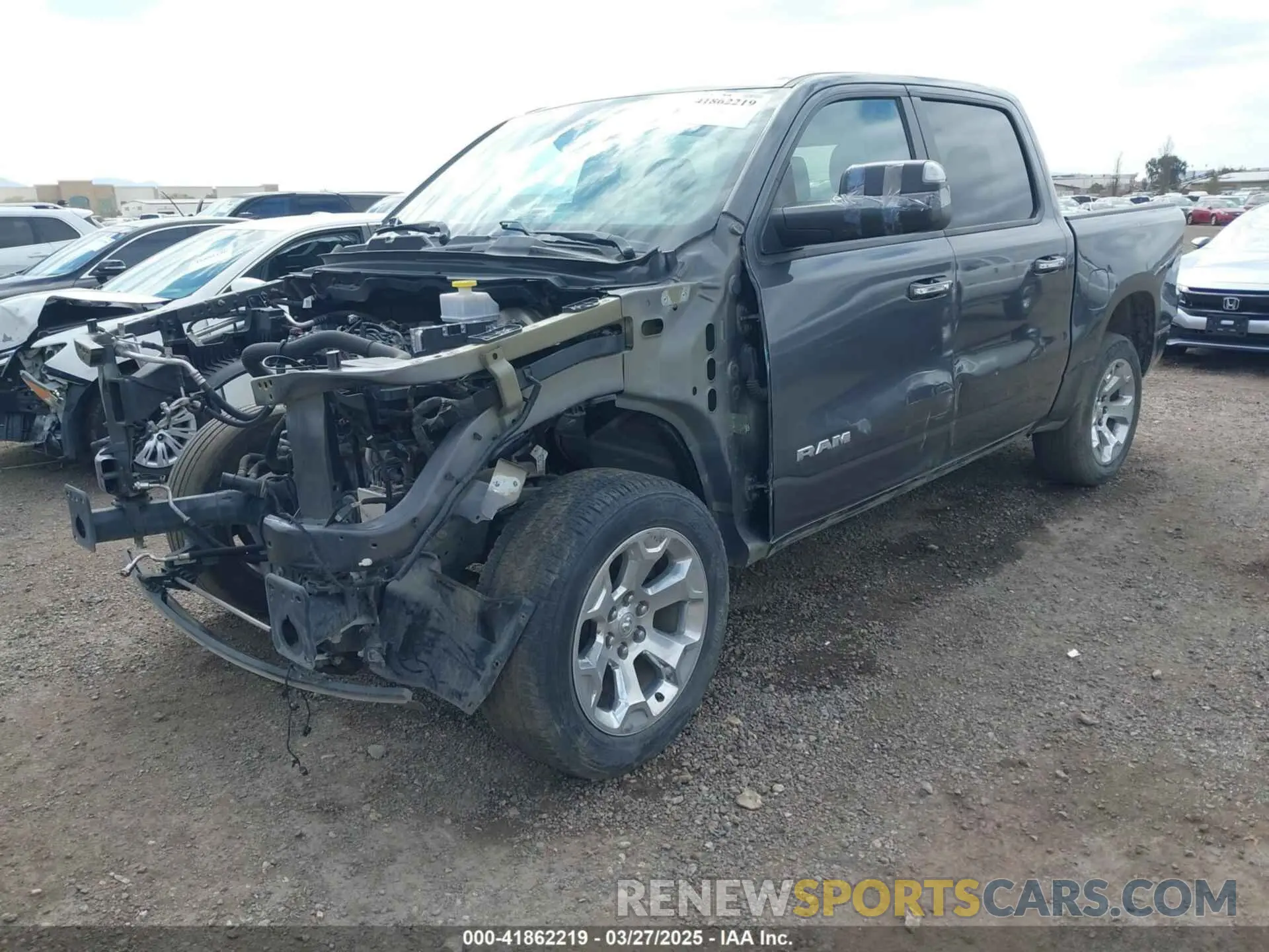 2 Photograph of a damaged car 1C6RREFT3KN601556 RAM 1500 2019