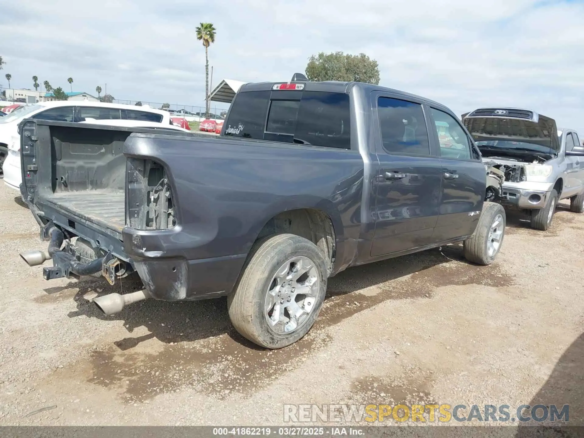 4 Photograph of a damaged car 1C6RREFT3KN601556 RAM 1500 2019