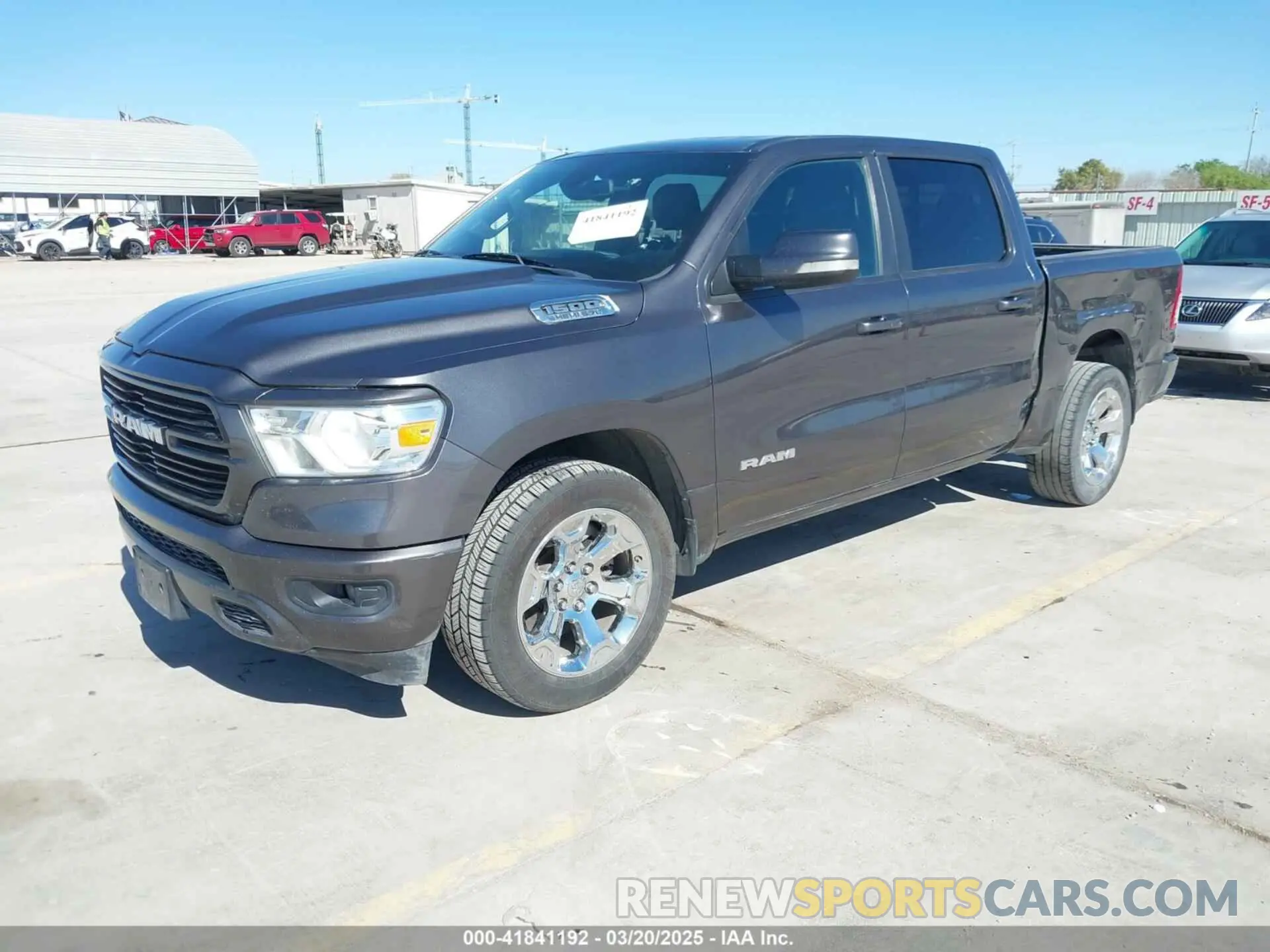 2 Photograph of a damaged car 1C6RREFT4KN679795 RAM 1500 2019