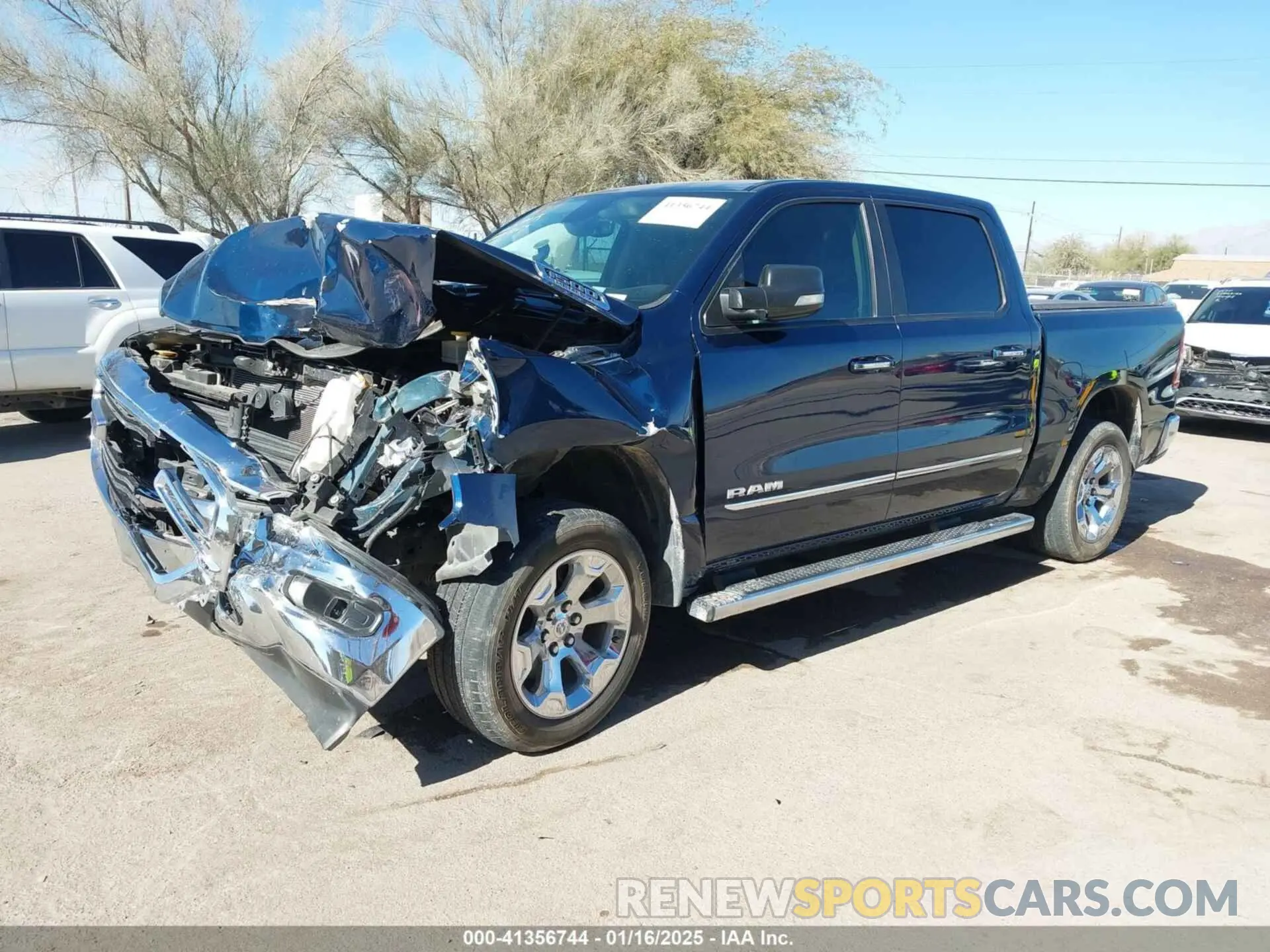 2 Photograph of a damaged car 1C6RREFT4KN769061 RAM 1500 2019