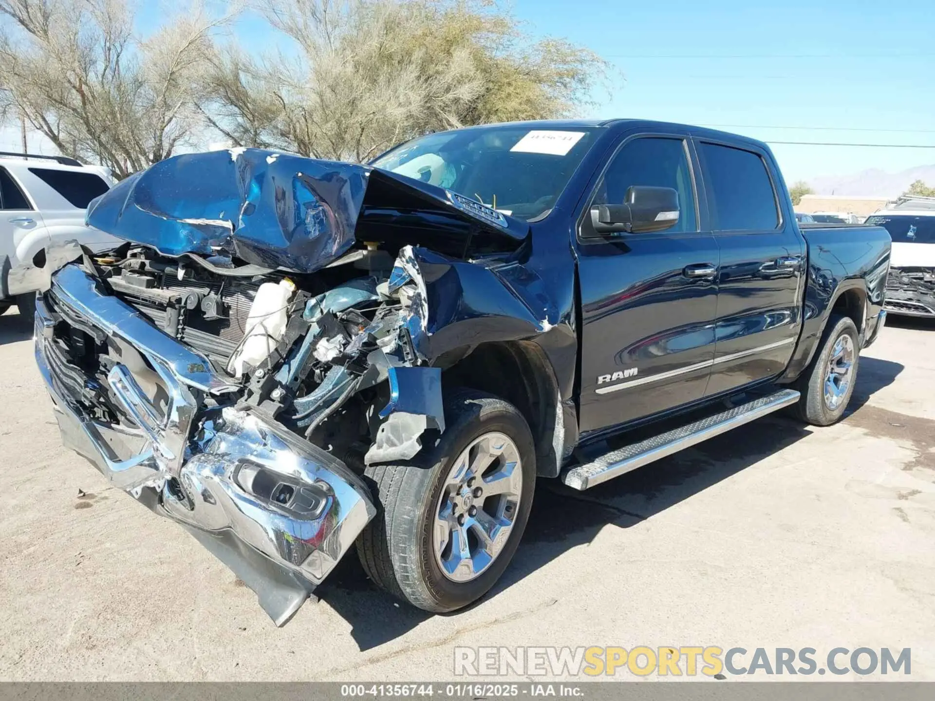 6 Photograph of a damaged car 1C6RREFT4KN769061 RAM 1500 2019