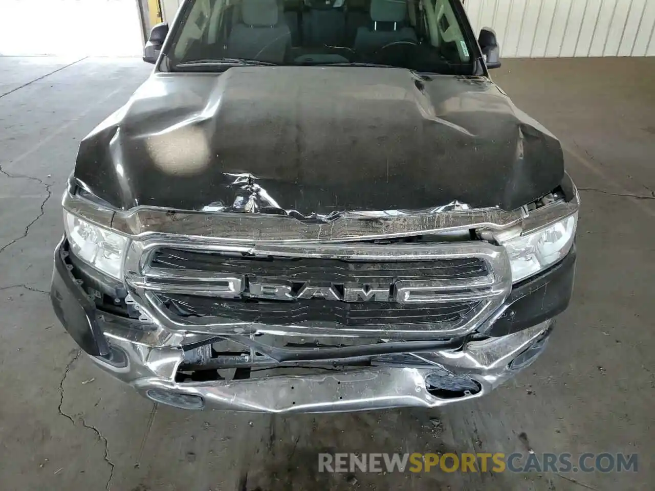 11 Photograph of a damaged car 1C6RREFT4KN769691 RAM 1500 2019