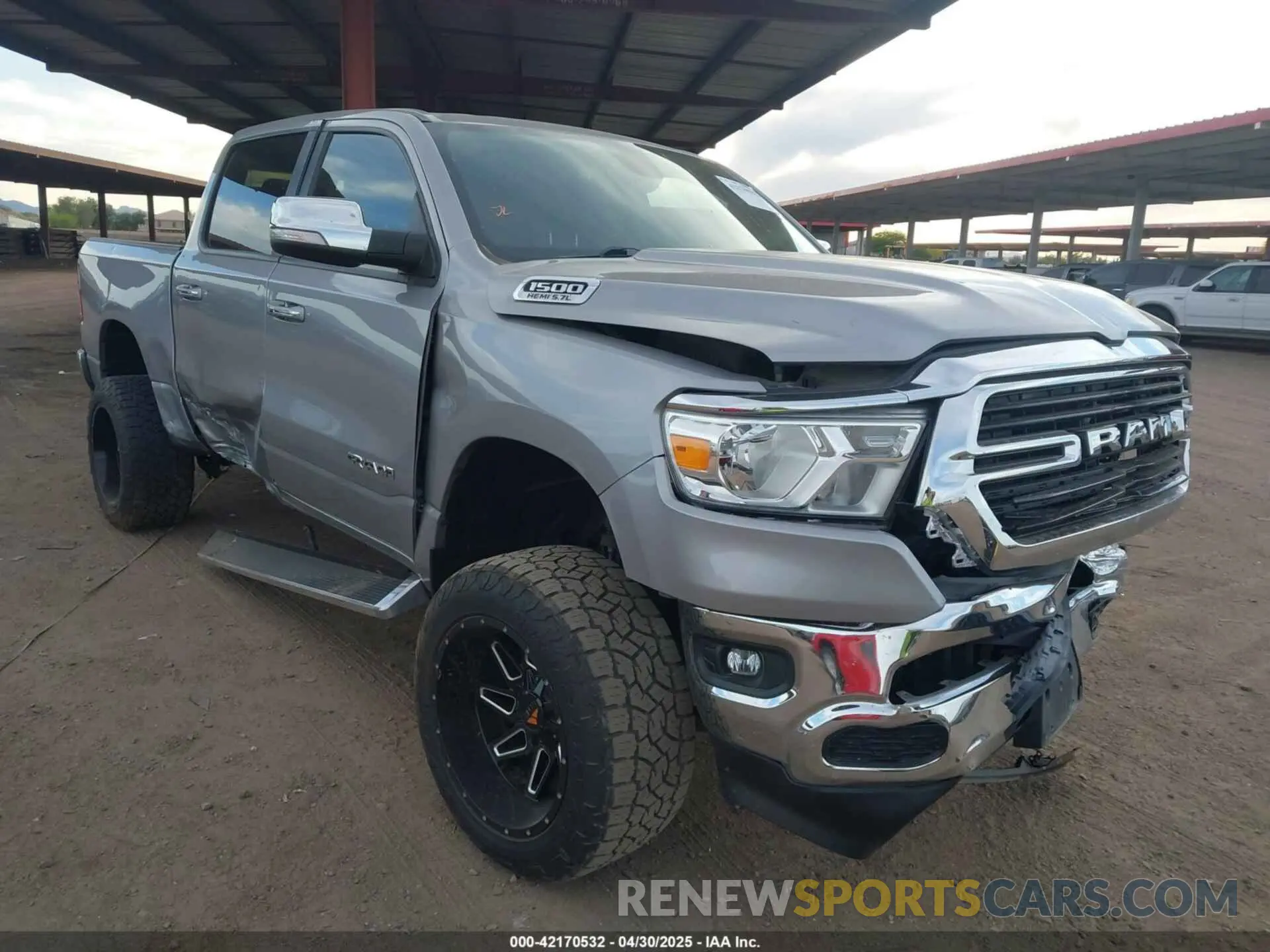 1 Photograph of a damaged car 1C6RREFT4KN828335 RAM 1500 2019