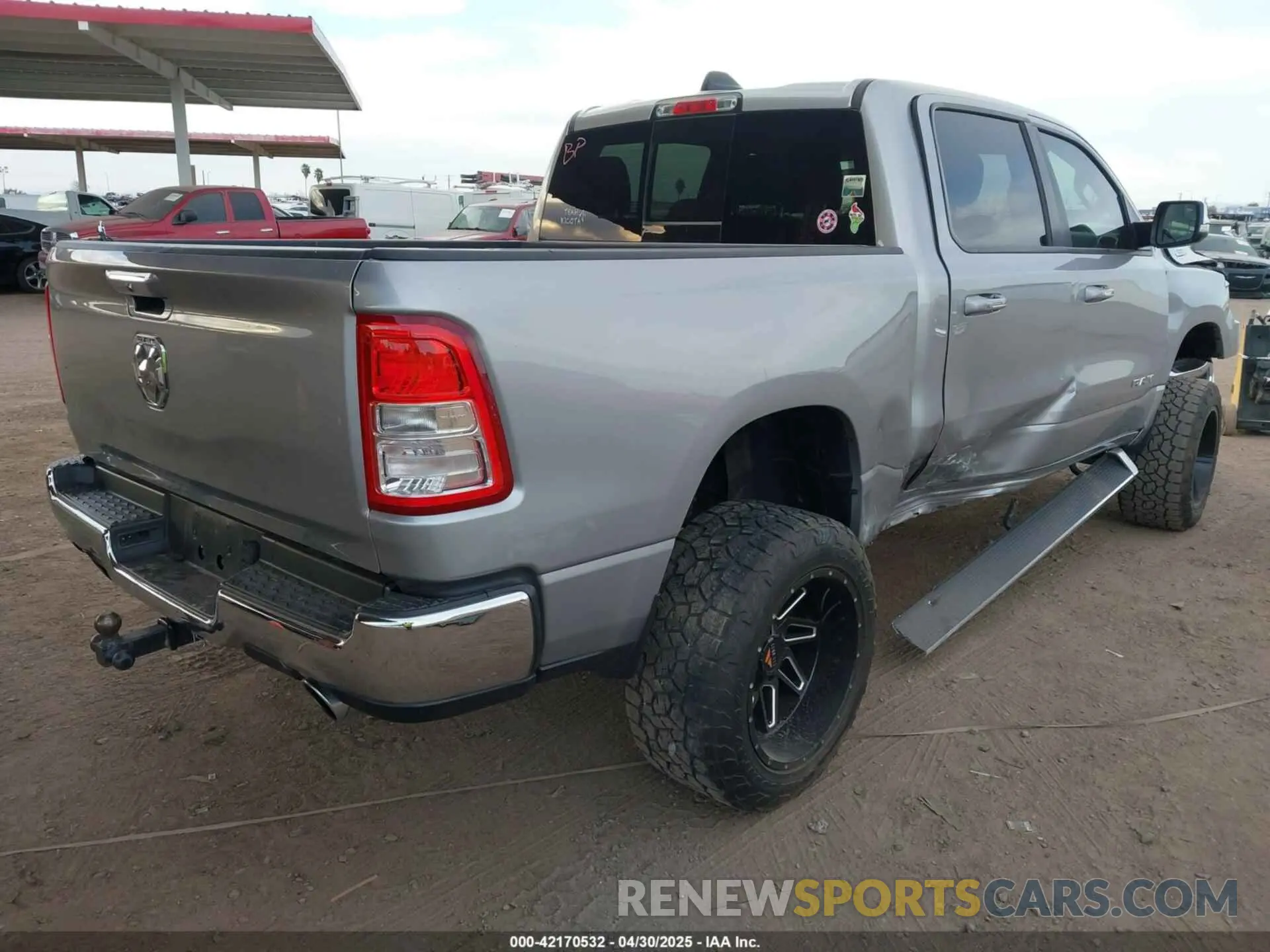 4 Photograph of a damaged car 1C6RREFT4KN828335 RAM 1500 2019