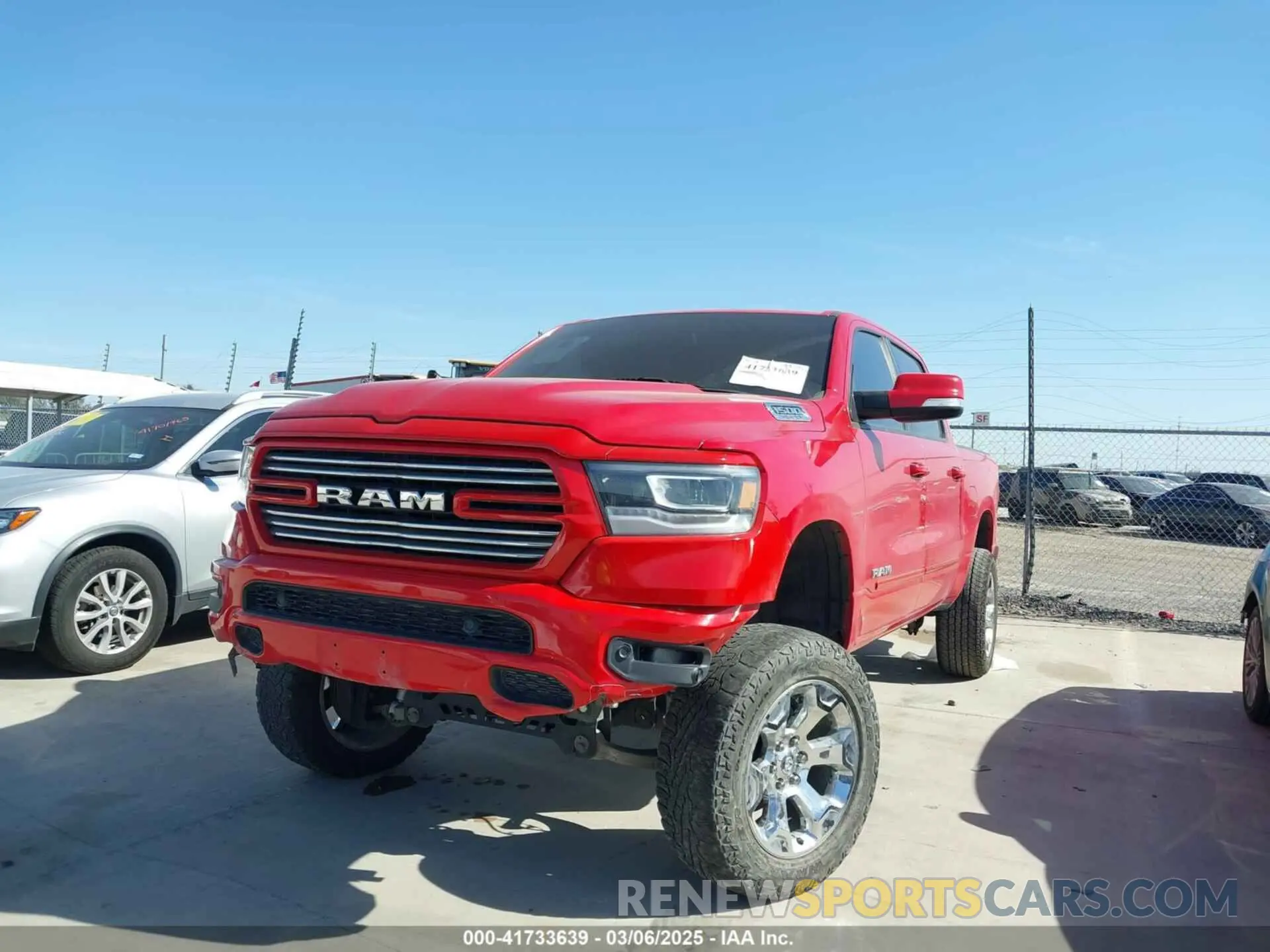 2 Photograph of a damaged car 1C6RREFT5KN548004 RAM 1500 2019