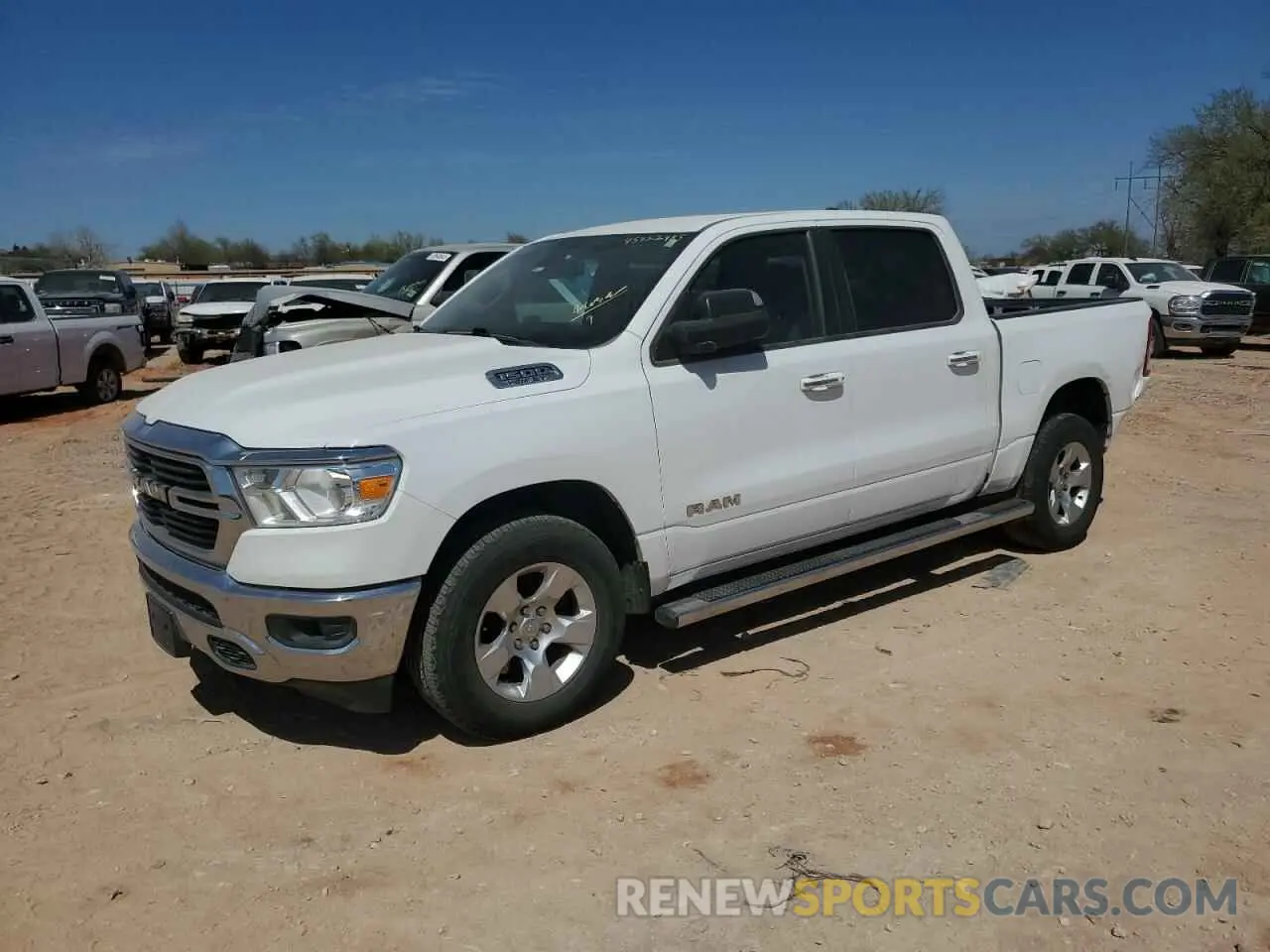 1 Photograph of a damaged car 1C6RREFT5KN660897 RAM 1500 2019