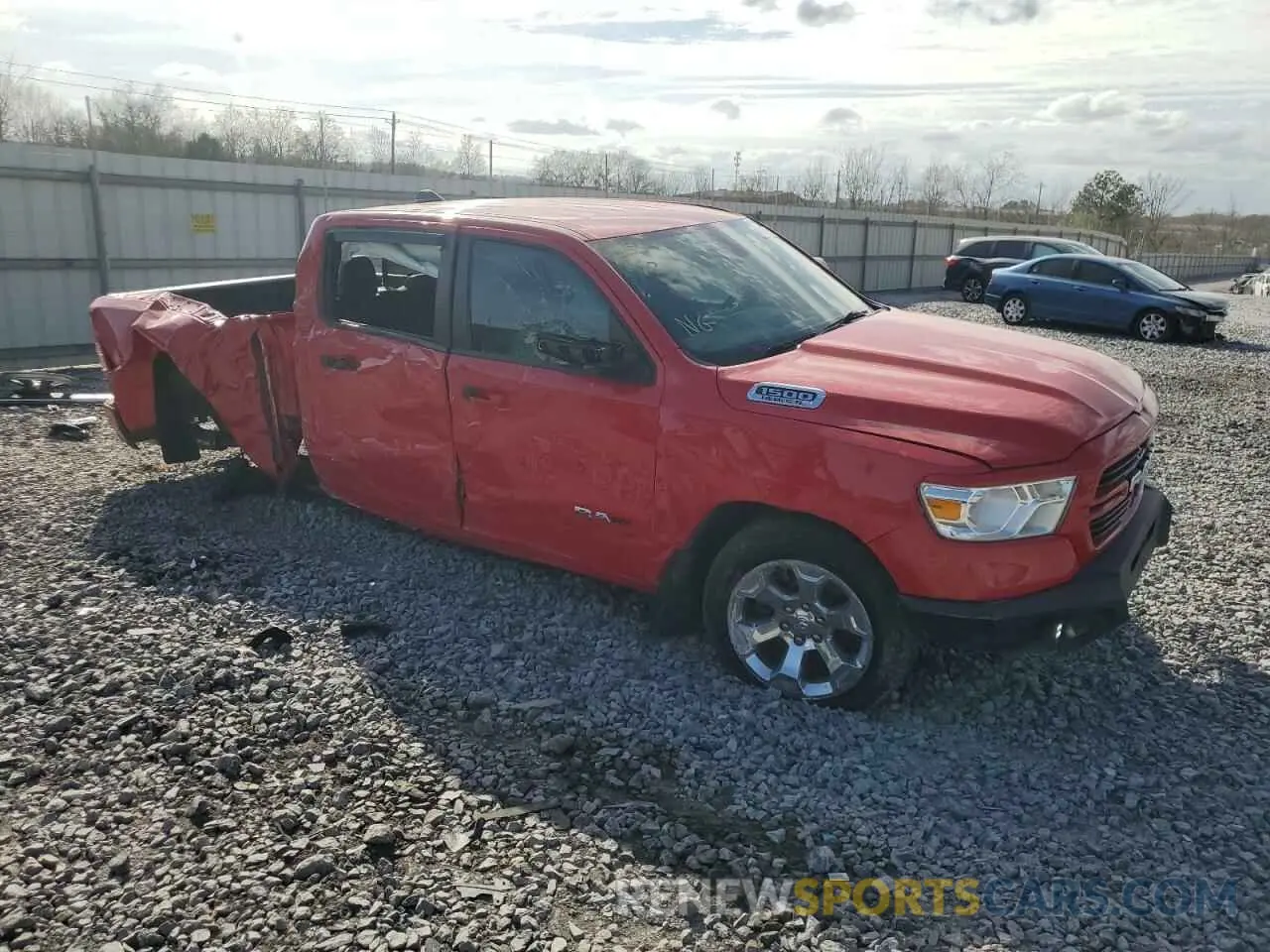 4 Photograph of a damaged car 1C6RREFT5KN664285 RAM 1500 2019