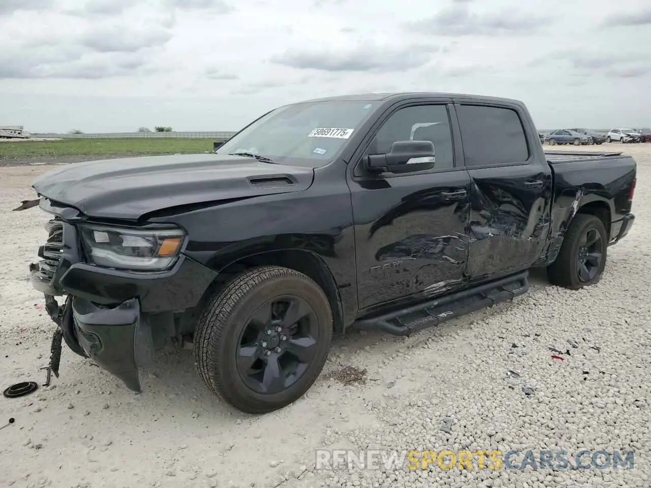 1 Photograph of a damaged car 1C6RREFT6KN509115 RAM 1500 2019