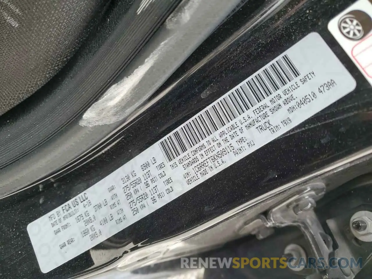 12 Photograph of a damaged car 1C6RREFT6KN509115 RAM 1500 2019