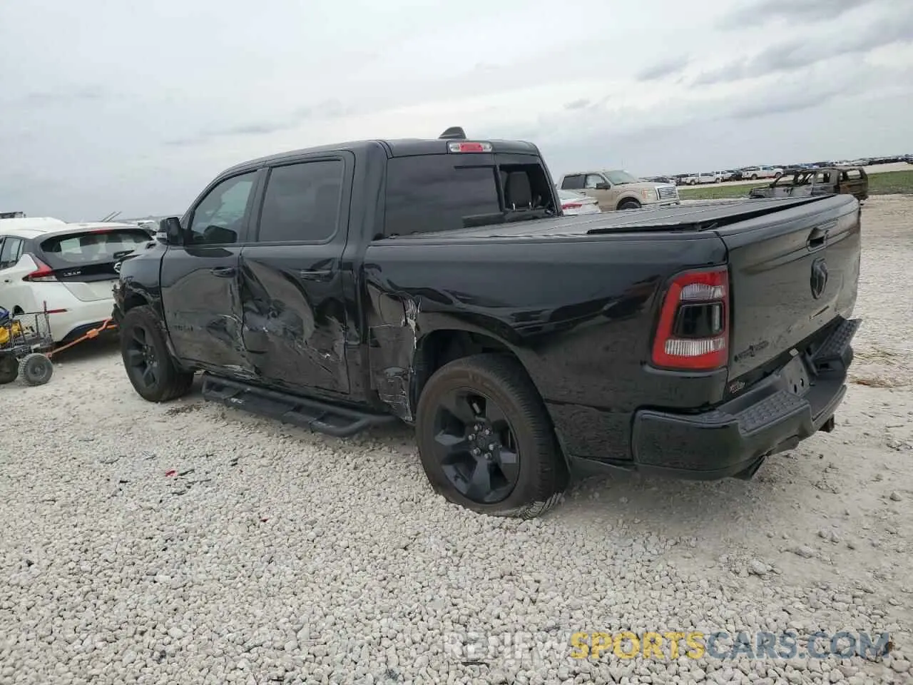 2 Photograph of a damaged car 1C6RREFT6KN509115 RAM 1500 2019