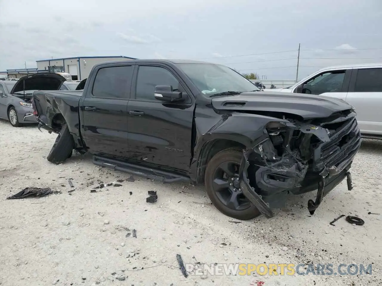 4 Photograph of a damaged car 1C6RREFT6KN509115 RAM 1500 2019