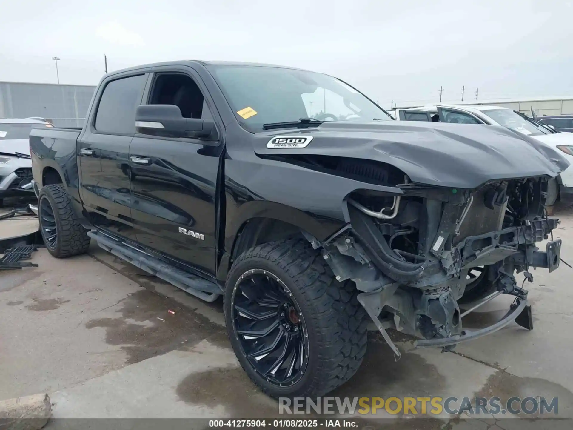 1 Photograph of a damaged car 1C6RREFT6KN706592 RAM 1500 2019