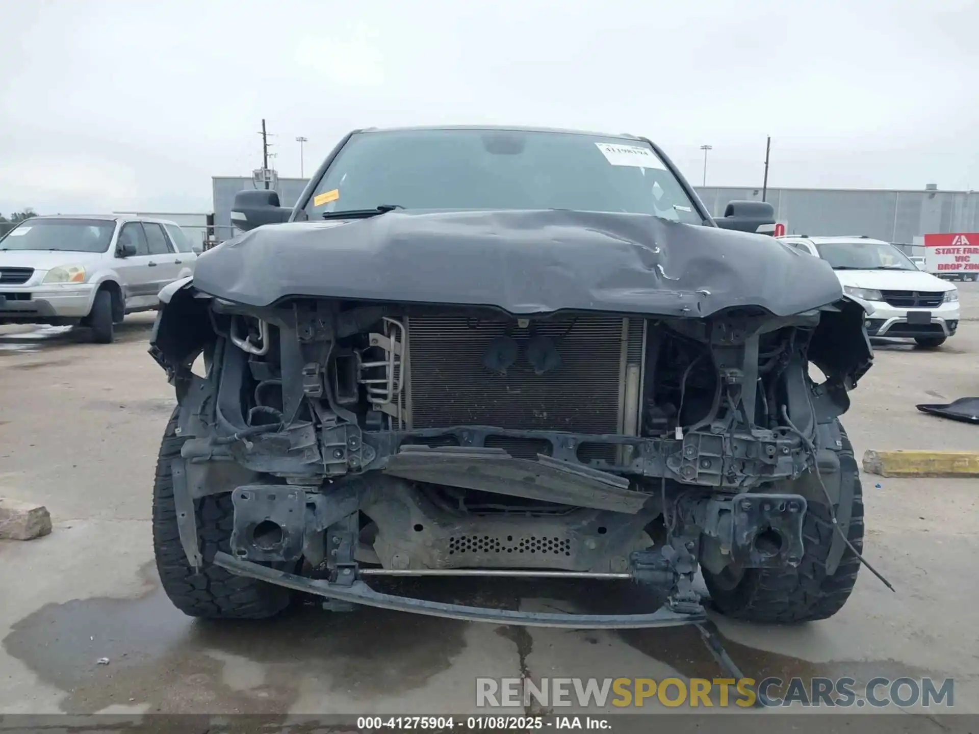 13 Photograph of a damaged car 1C6RREFT6KN706592 RAM 1500 2019