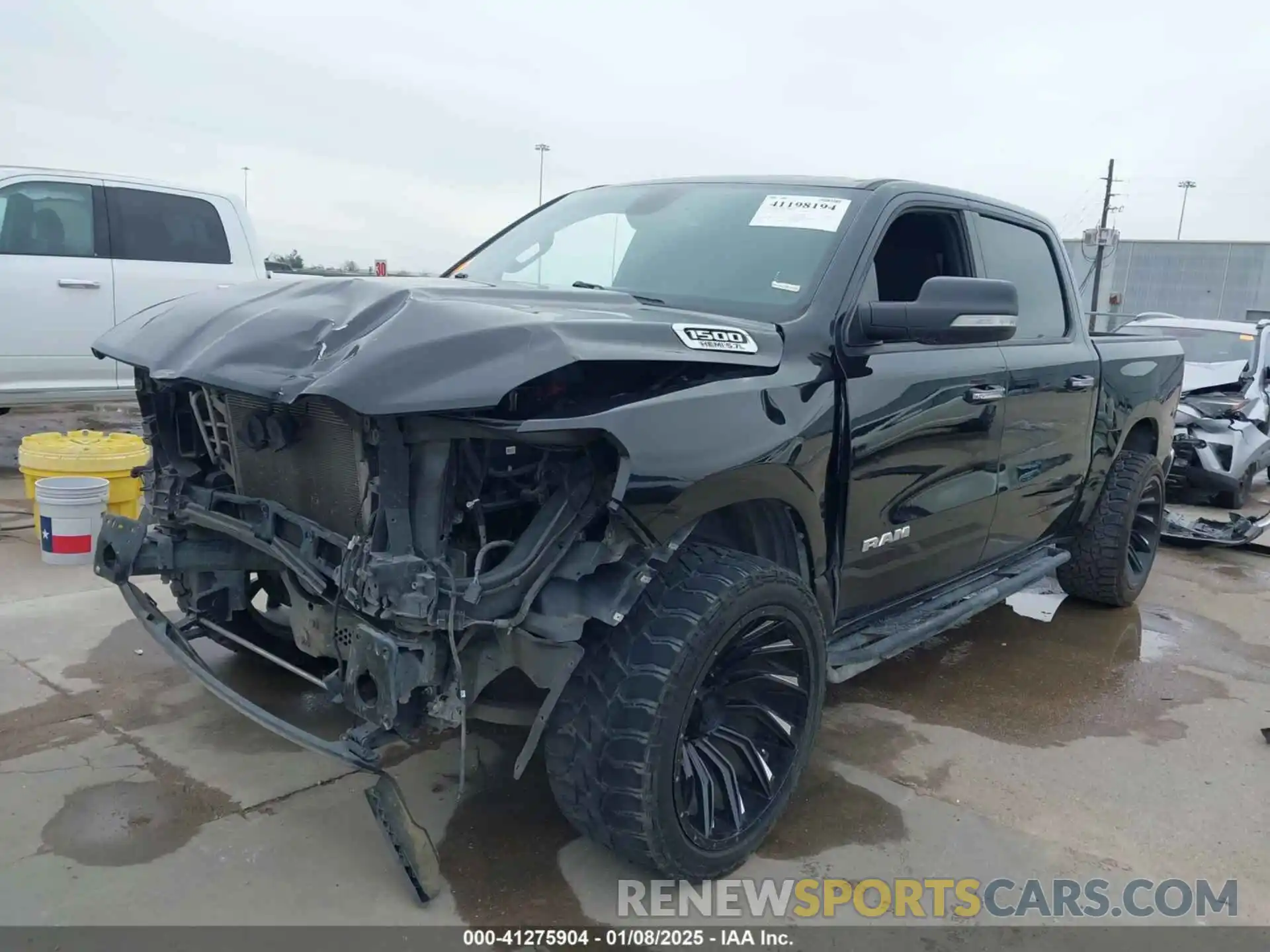 2 Photograph of a damaged car 1C6RREFT6KN706592 RAM 1500 2019