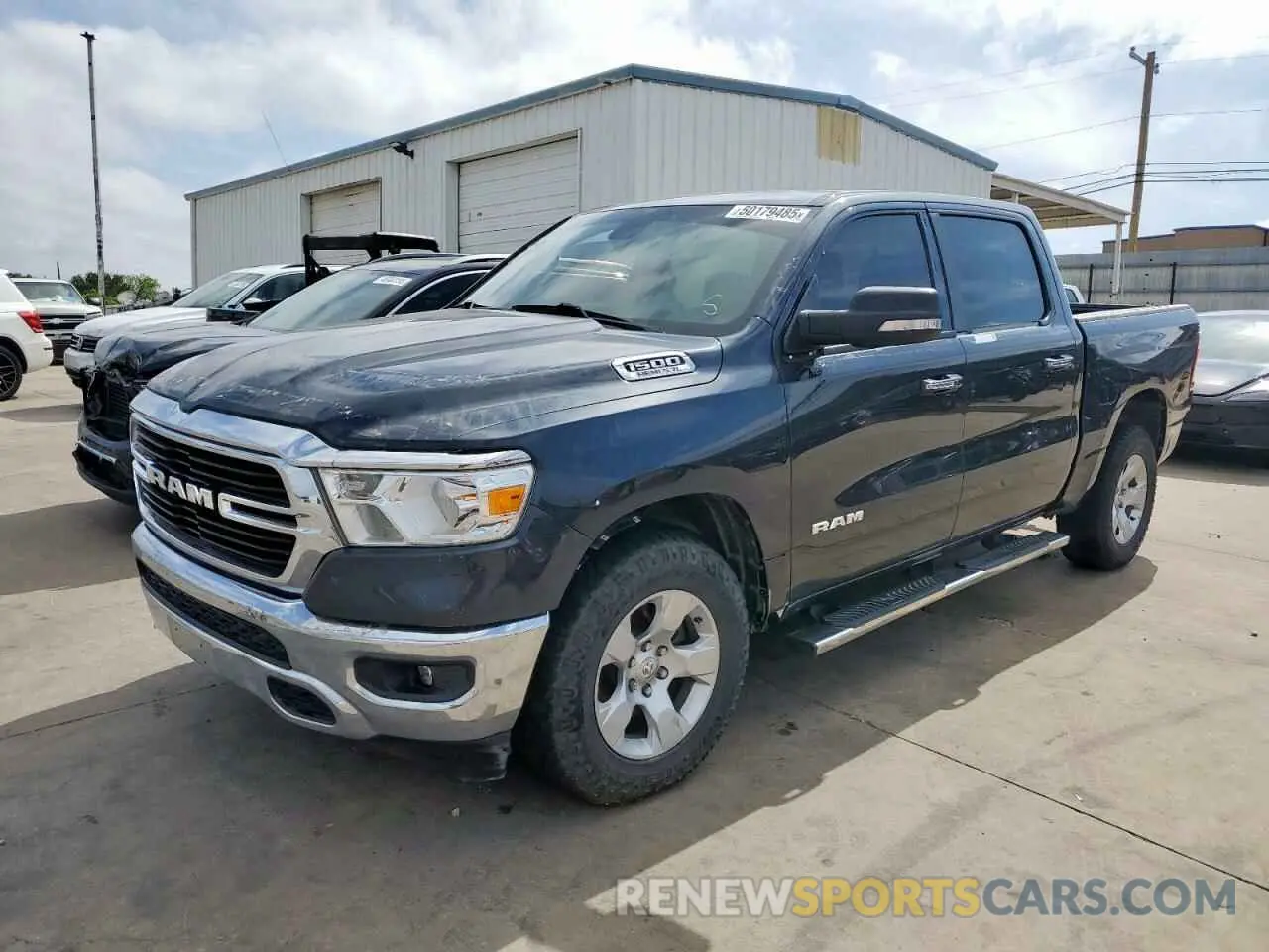 1 Photograph of a damaged car 1C6RREFT6KN828966 RAM 1500 2019