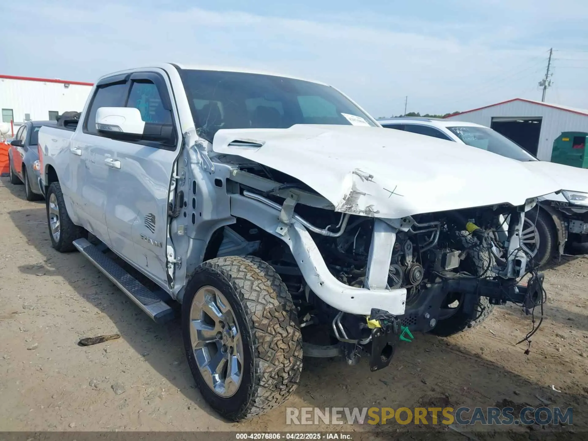 1 Photograph of a damaged car 1C6RREFT7KN880929 RAM 1500 2019