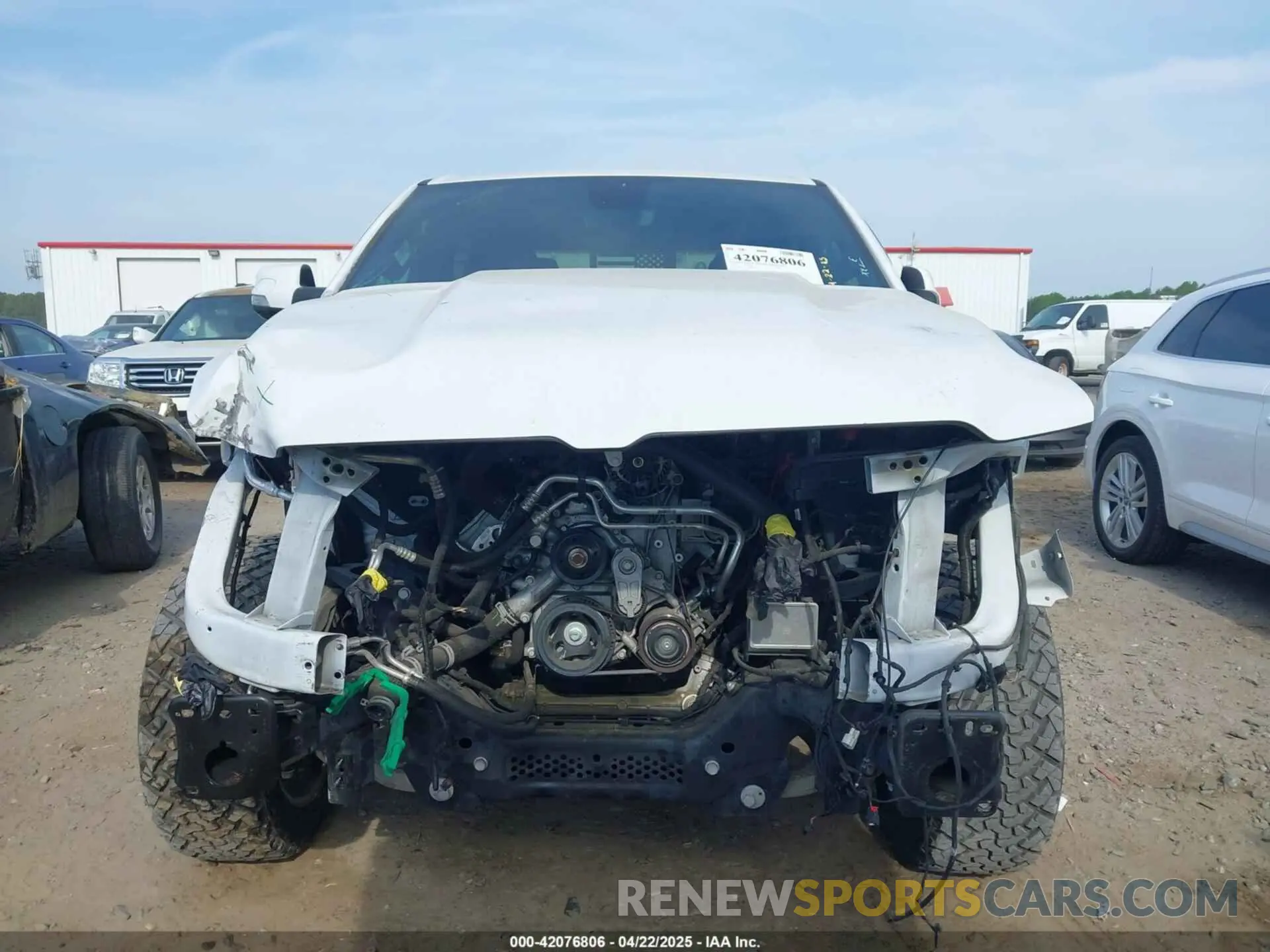 13 Photograph of a damaged car 1C6RREFT7KN880929 RAM 1500 2019