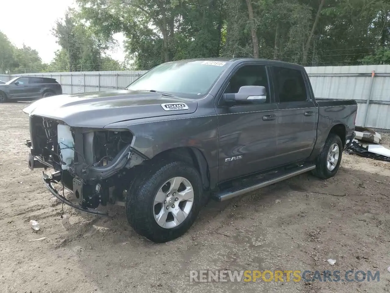 1 Photograph of a damaged car 1C6RREFT8KN548689 RAM 1500 2019