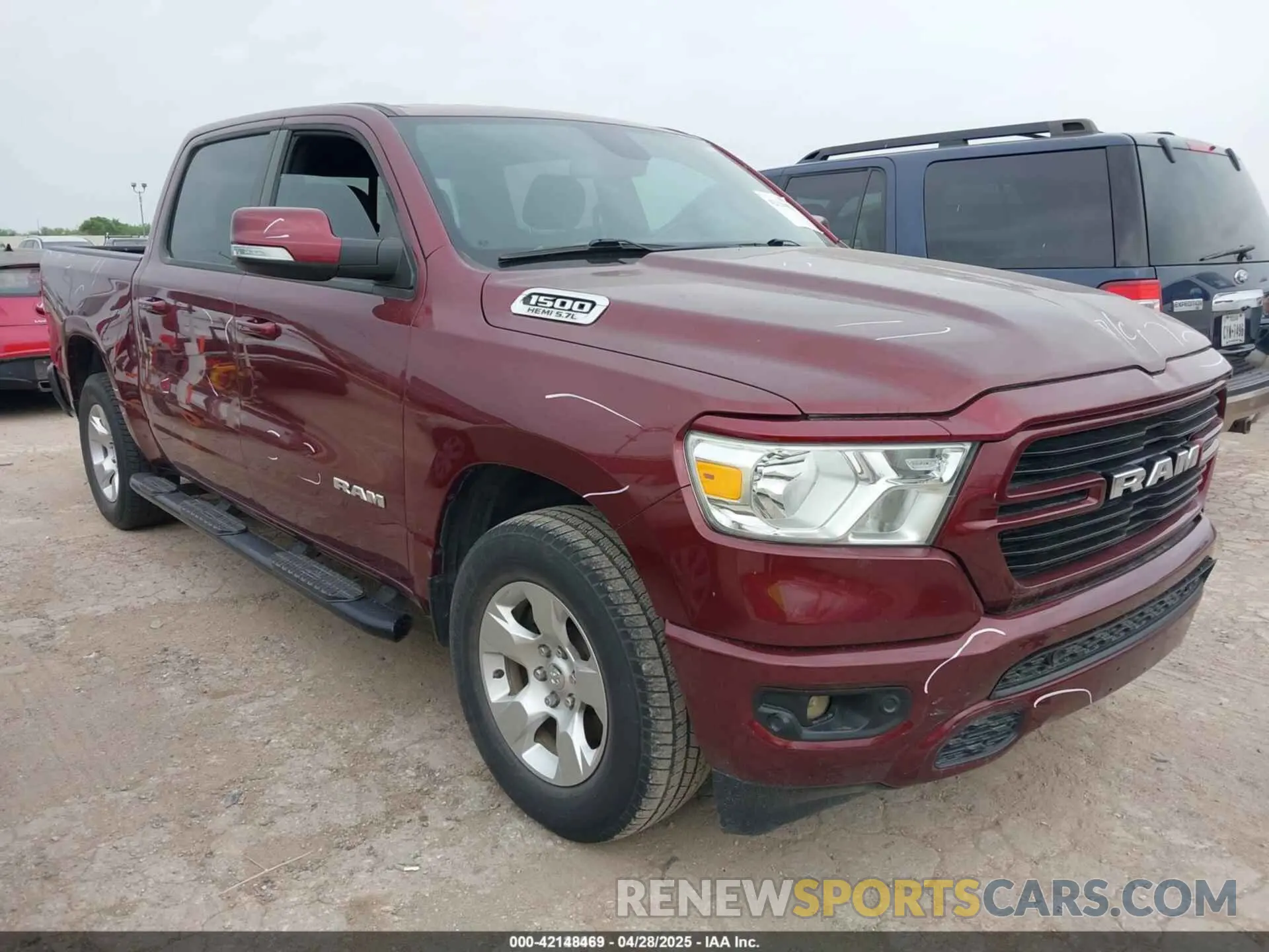 1 Photograph of a damaged car 1C6RREFT8KN635282 RAM 1500 2019