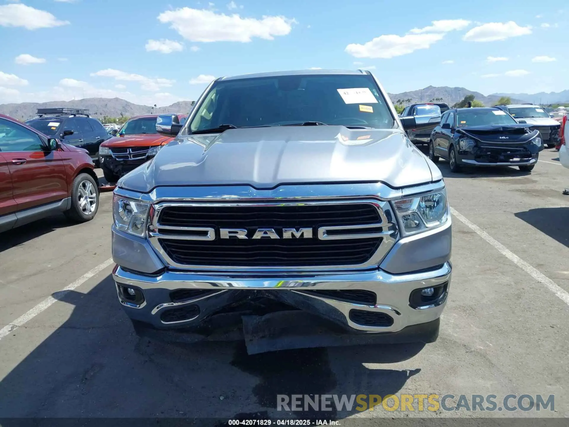 12 Photograph of a damaged car 1C6RREFT8KN828337 RAM 1500 2019