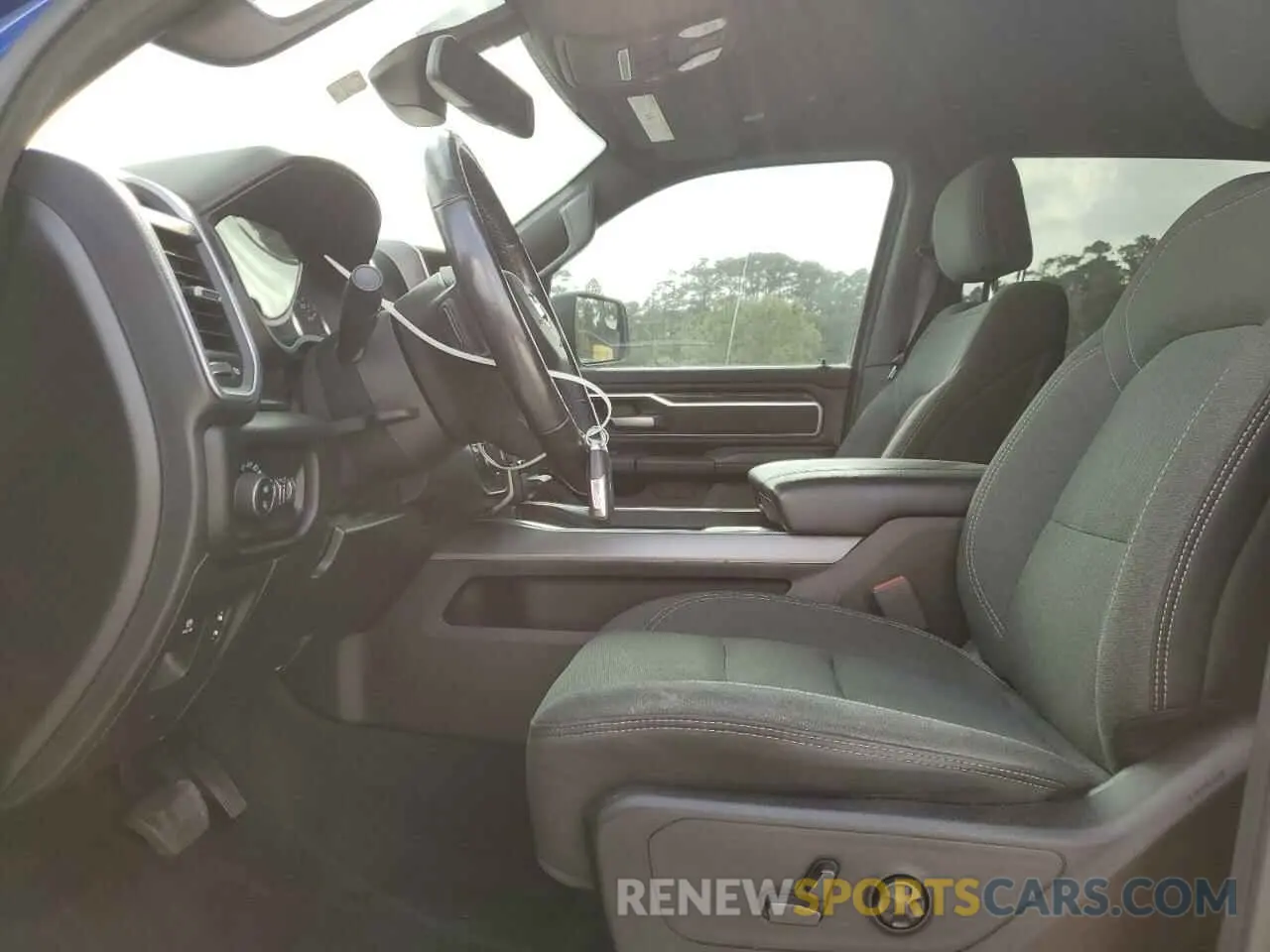 7 Photograph of a damaged car 1C6RREFT9KN616420 RAM 1500 2019