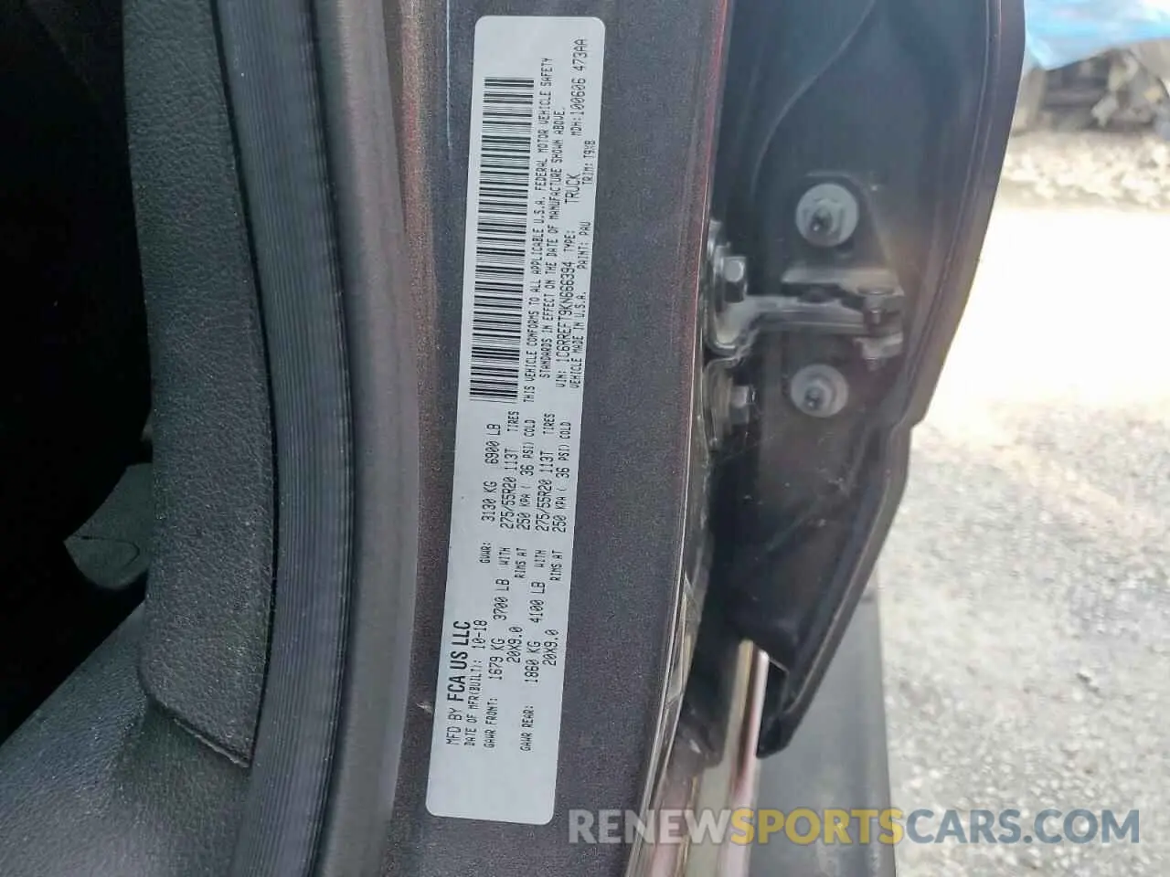12 Photograph of a damaged car 1C6RREFT9KN666394 RAM 1500 2019