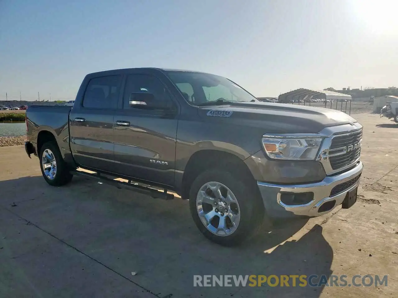 4 Photograph of a damaged car 1C6RREFT9KN666394 RAM 1500 2019