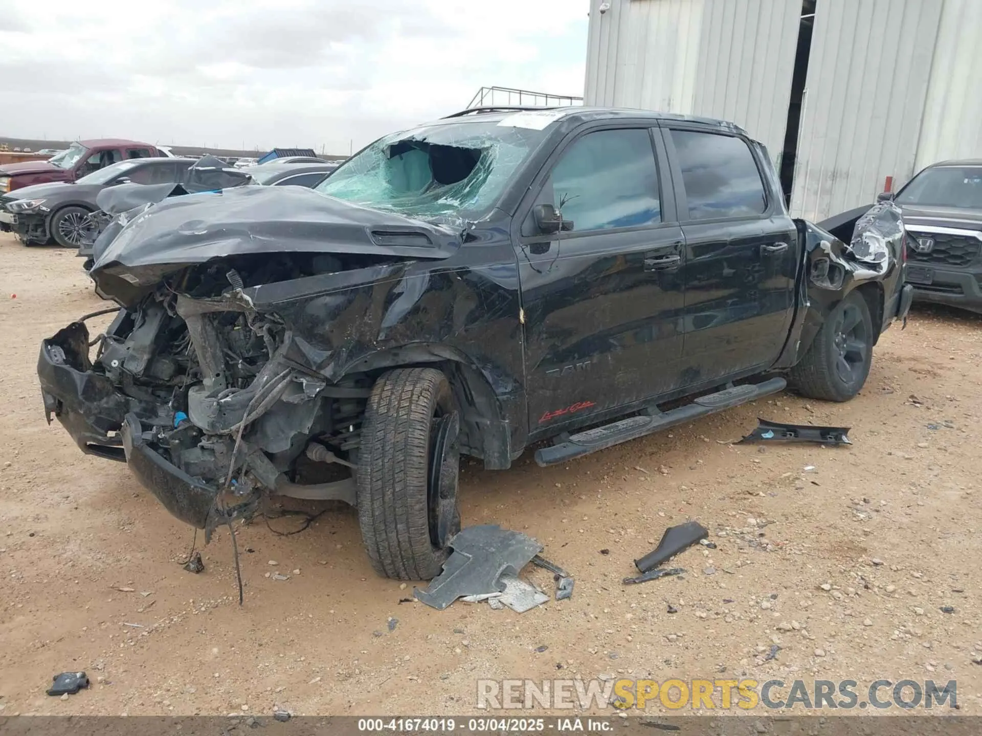 2 Photograph of a damaged car 1C6RREFTXKN518223 RAM 1500 2019
