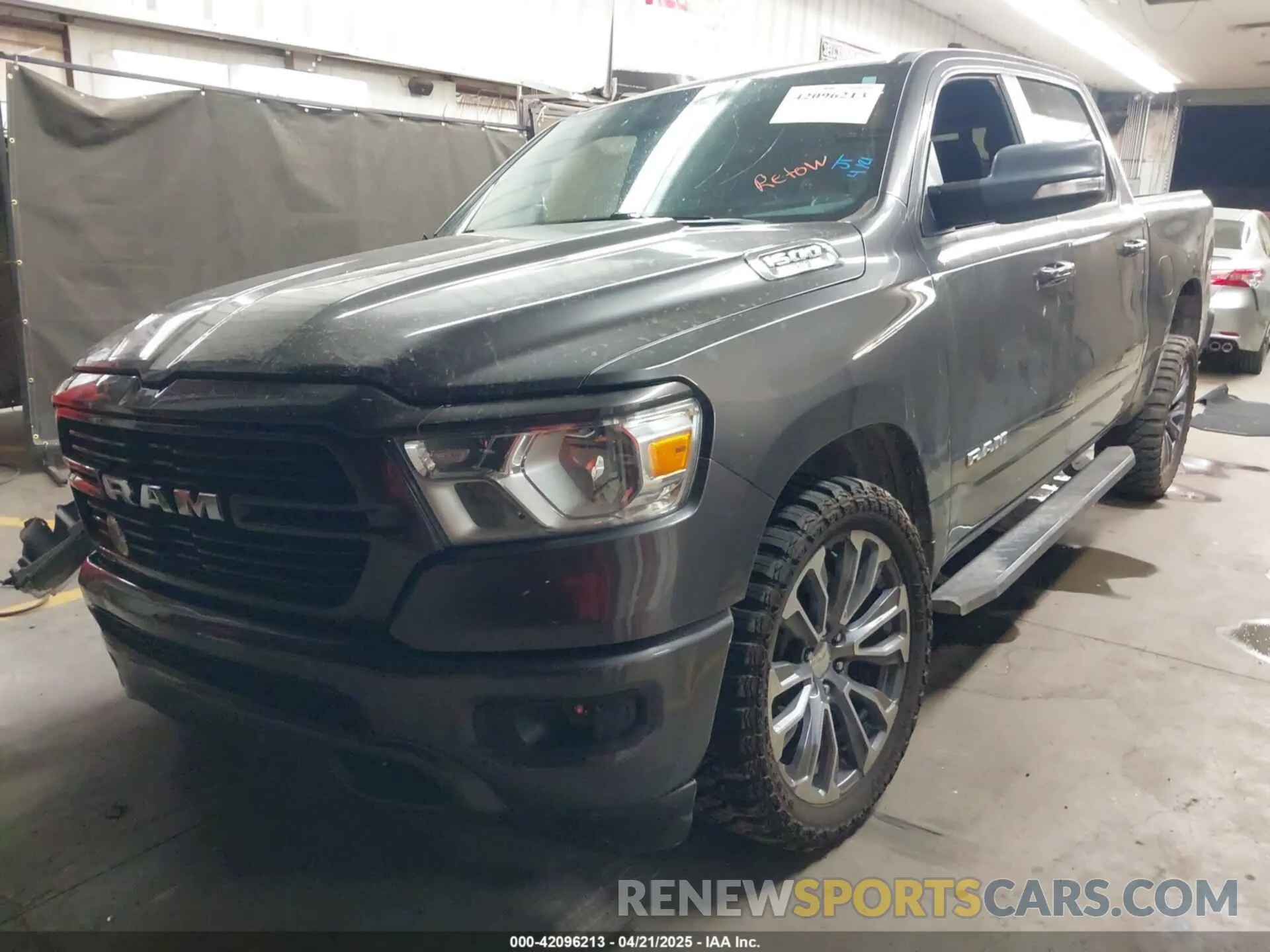2 Photograph of a damaged car 1C6RREFTXKN596646 RAM 1500 2019