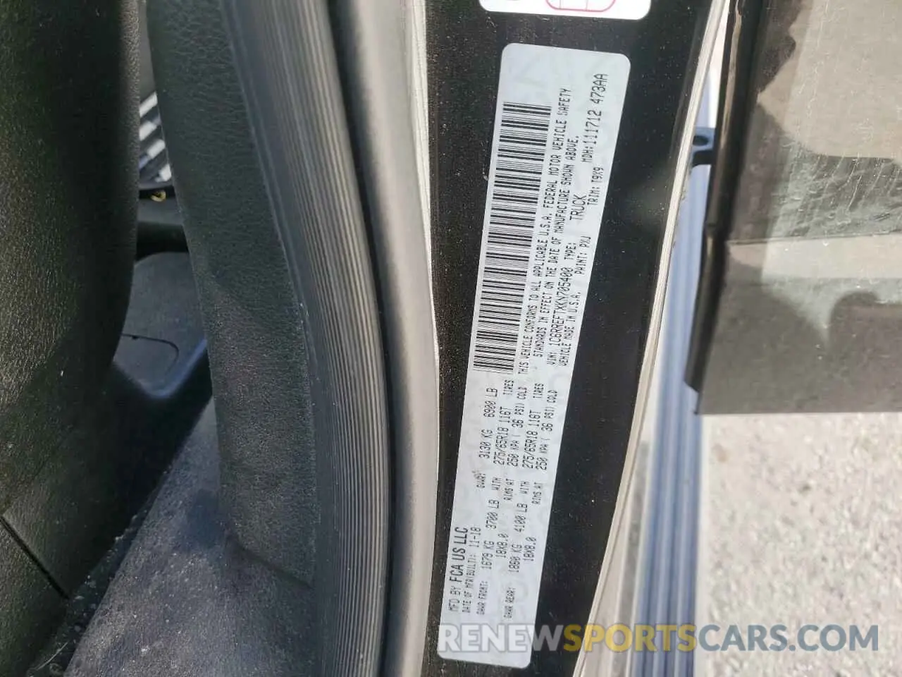 12 Photograph of a damaged car 1C6RREFTXKN705400 RAM 1500 2019