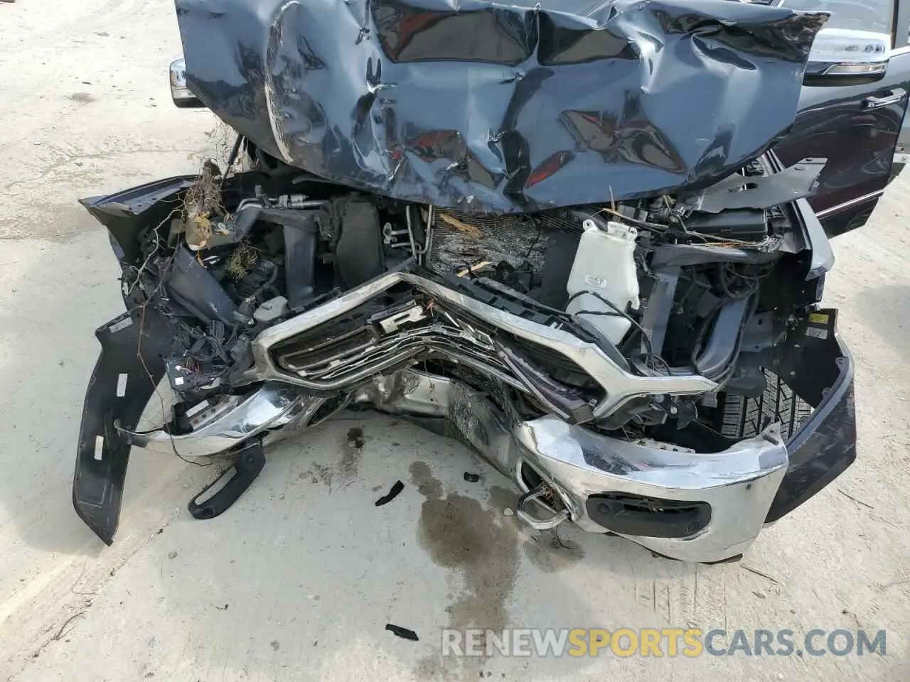 11 Photograph of a damaged car 1C6RREHT2KN801311 RAM 1500 2019