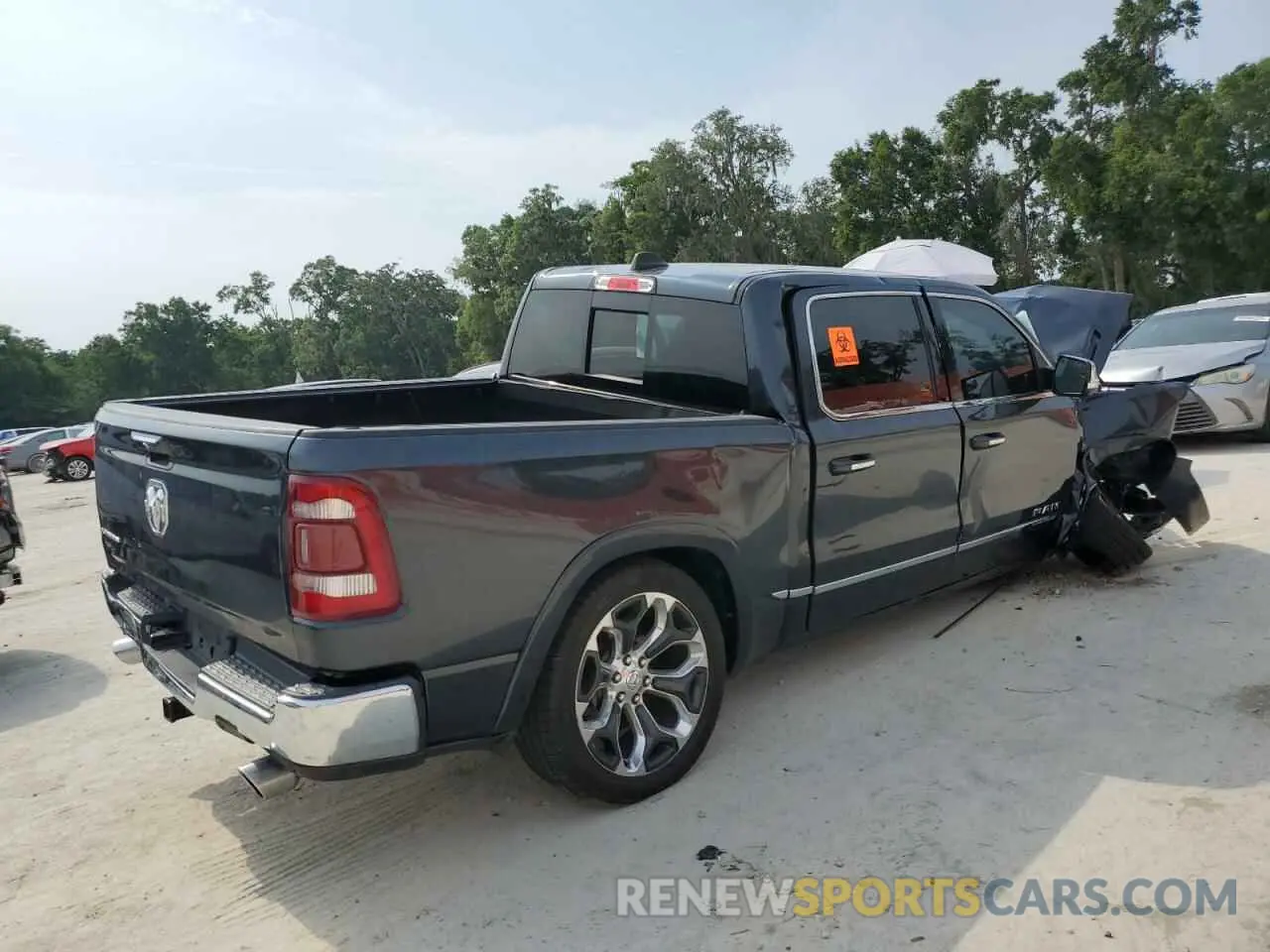 3 Photograph of a damaged car 1C6RREHT2KN801311 RAM 1500 2019