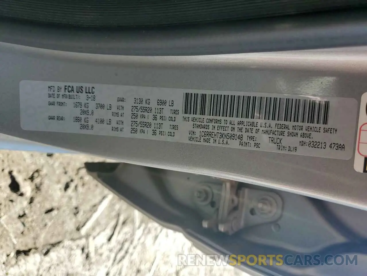 12 Photograph of a damaged car 1C6RREHT3KN509148 RAM 1500 2019