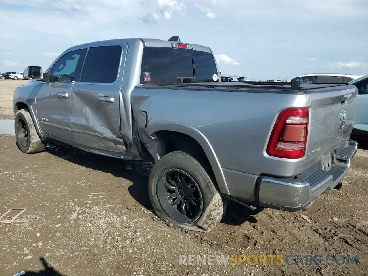 2 Photograph of a damaged car 1C6RREHT3KN509148 RAM 1500 2019