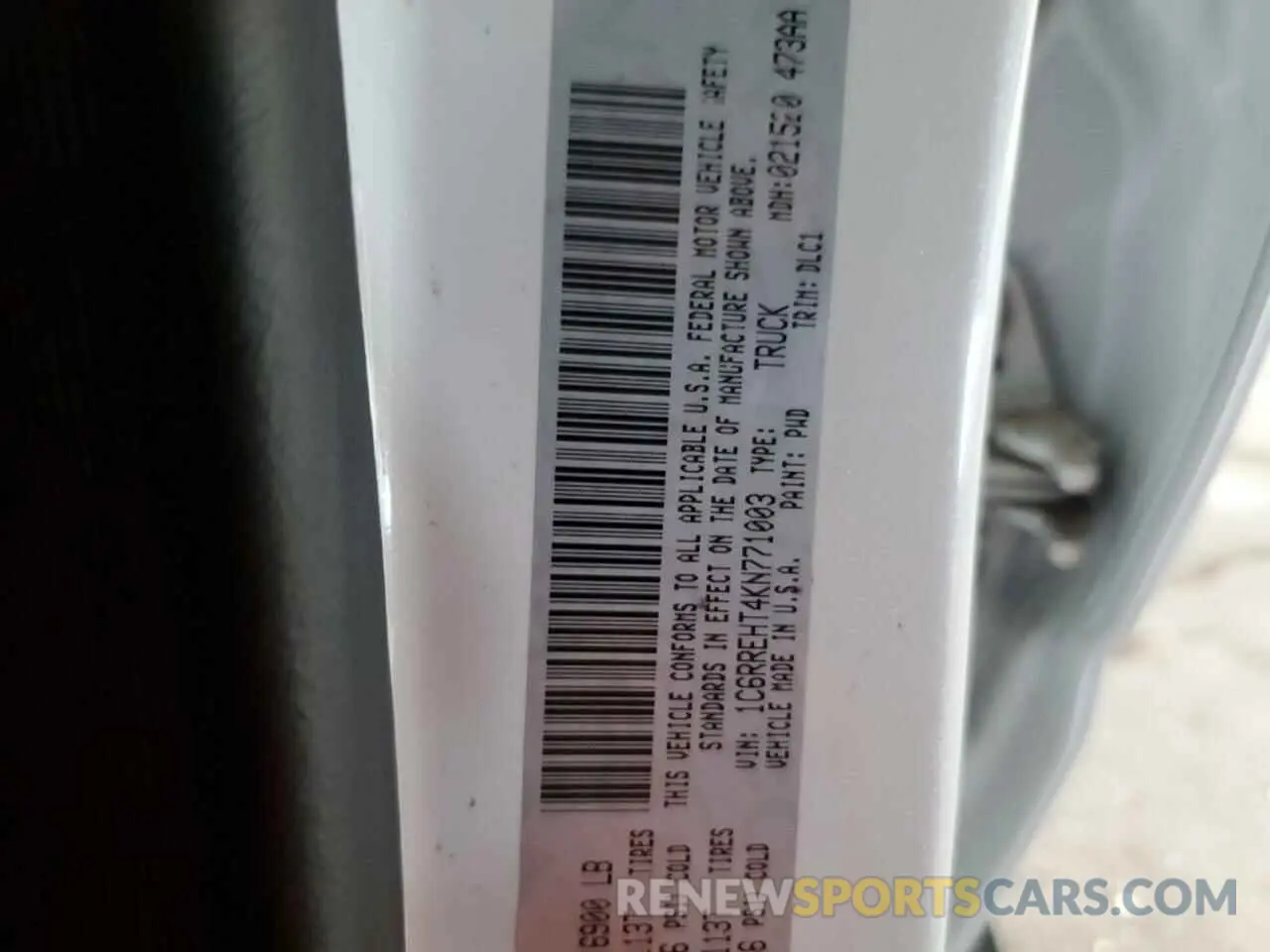 14 Photograph of a damaged car 1C6RREHT4KN771003 RAM 1500 2019
