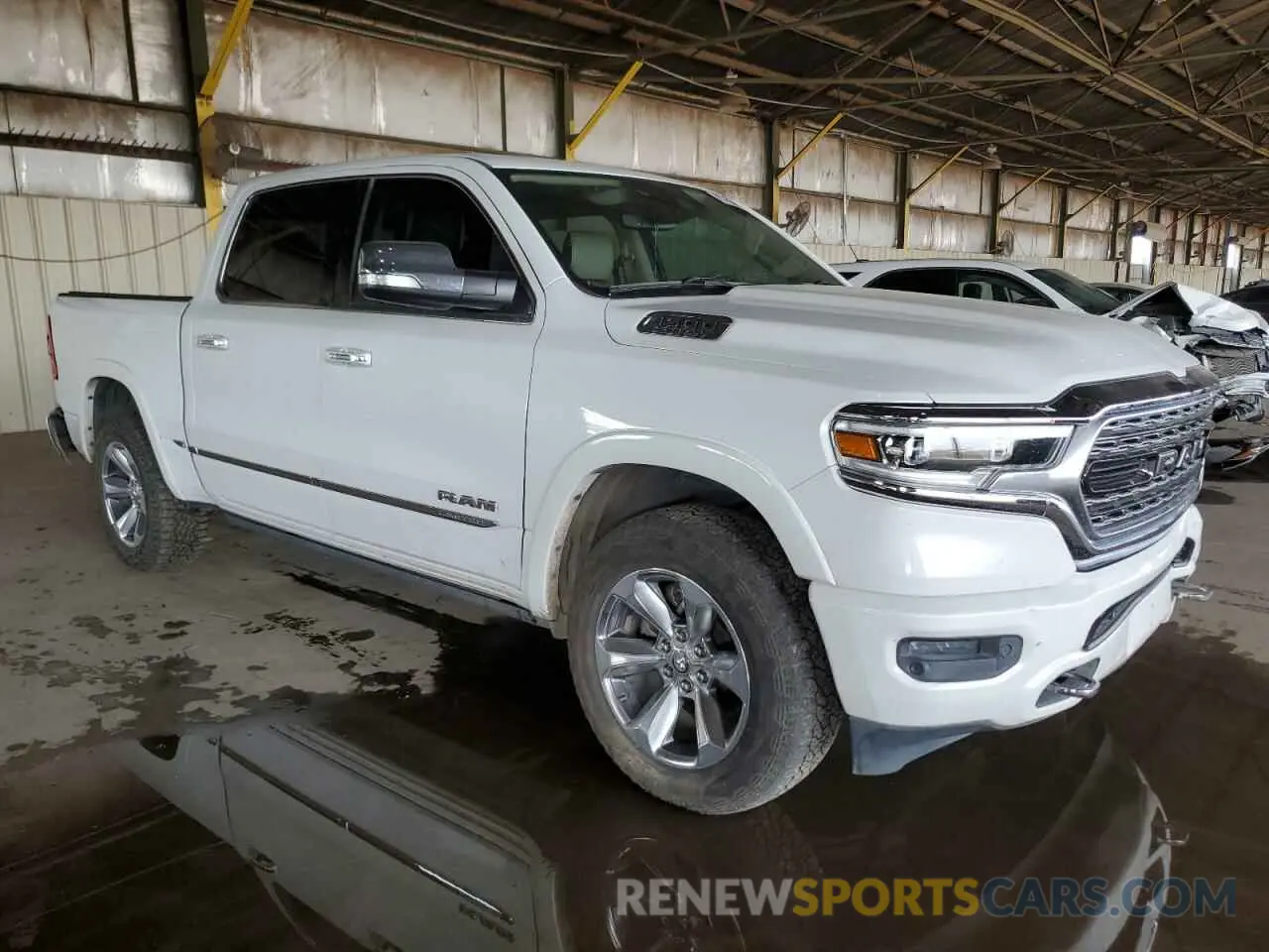 4 Photograph of a damaged car 1C6RREHT4KN771003 RAM 1500 2019