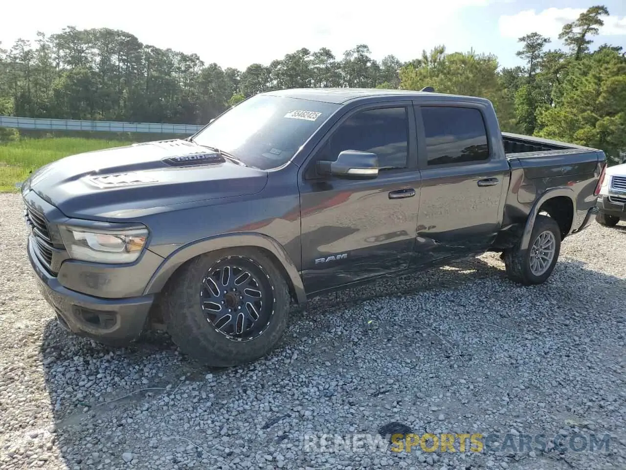 1 Photograph of a damaged car 1C6RREJT2KN792572 RAM 1500 2019