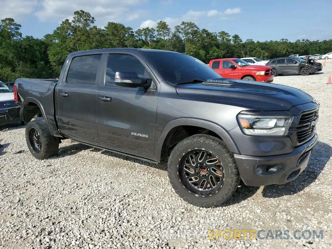 4 Photograph of a damaged car 1C6RREJT2KN792572 RAM 1500 2019