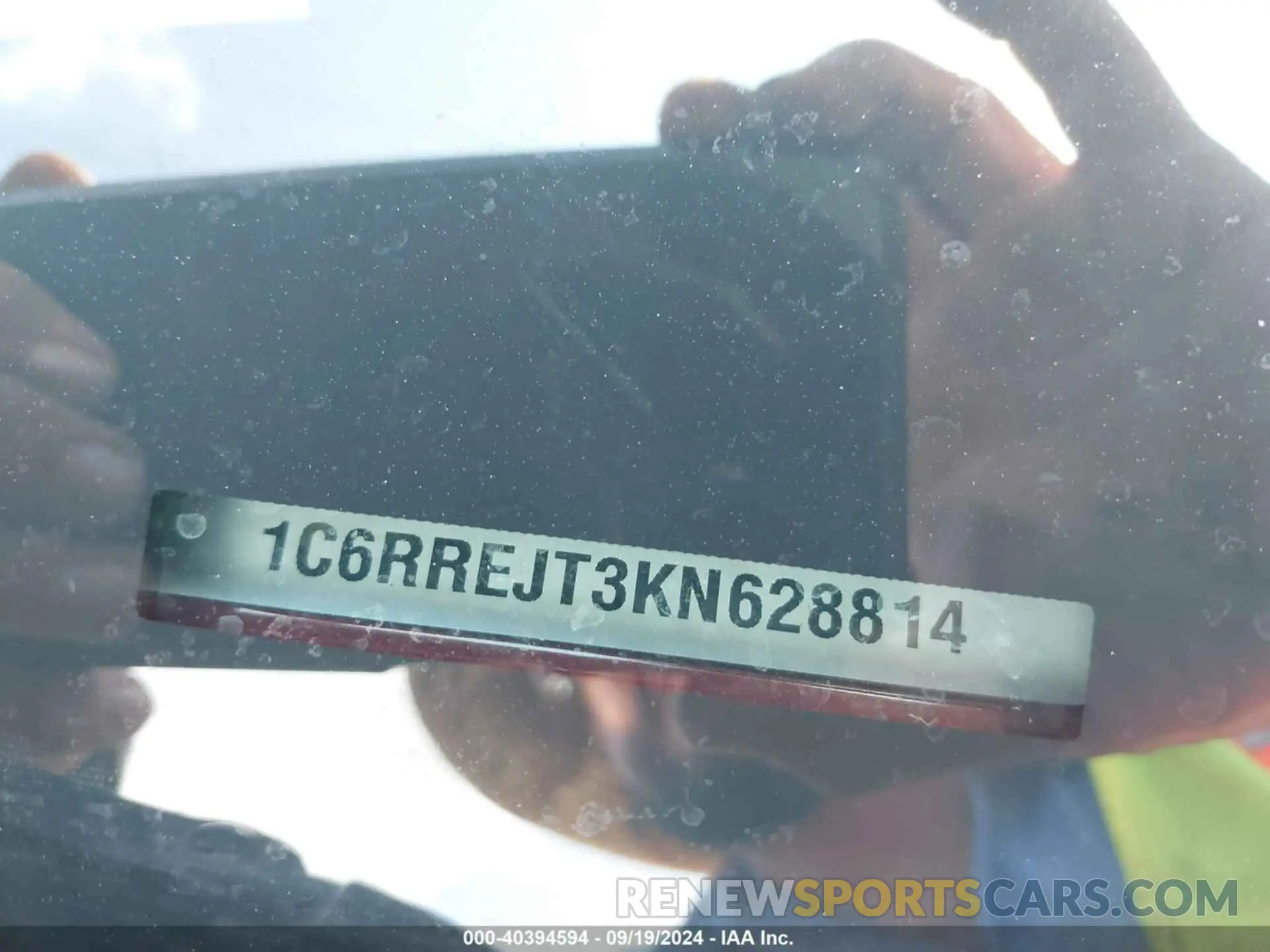 9 Photograph of a damaged car 1C6RREJT3KN628814 RAM 1500 2019