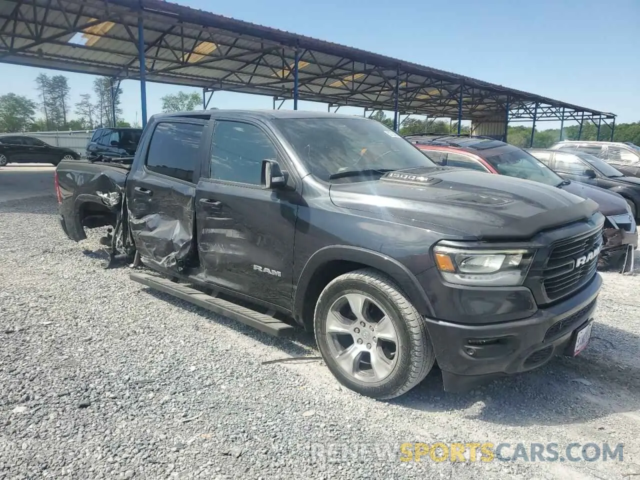 4 Photograph of a damaged car 1C6RREJT4KN601072 RAM 1500 2019