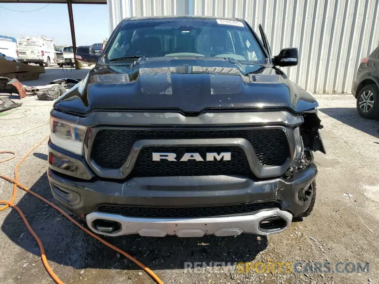 5 Photograph of a damaged car 1C6RRELT0KN828238 RAM 1500 2019