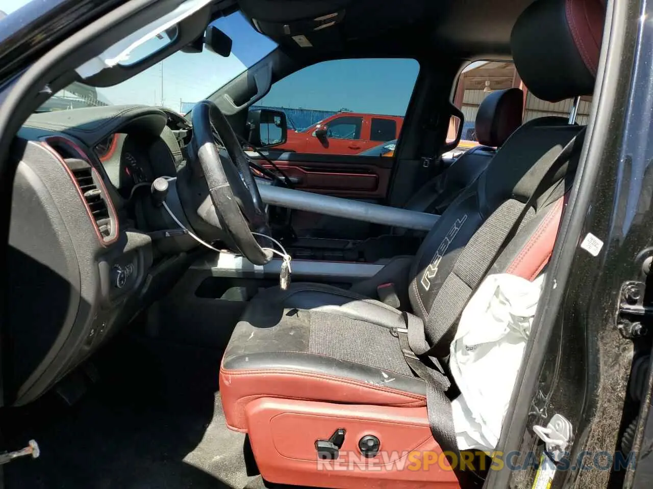 7 Photograph of a damaged car 1C6RRELT0KN828238 RAM 1500 2019