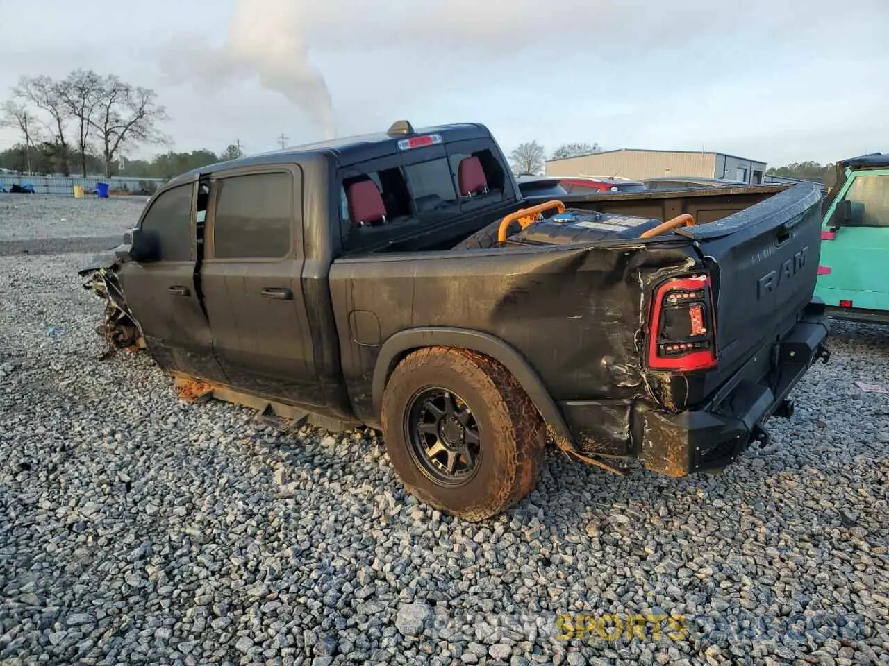 2 Photograph of a damaged car 1C6RRELT2KN724222 RAM 1500 2019