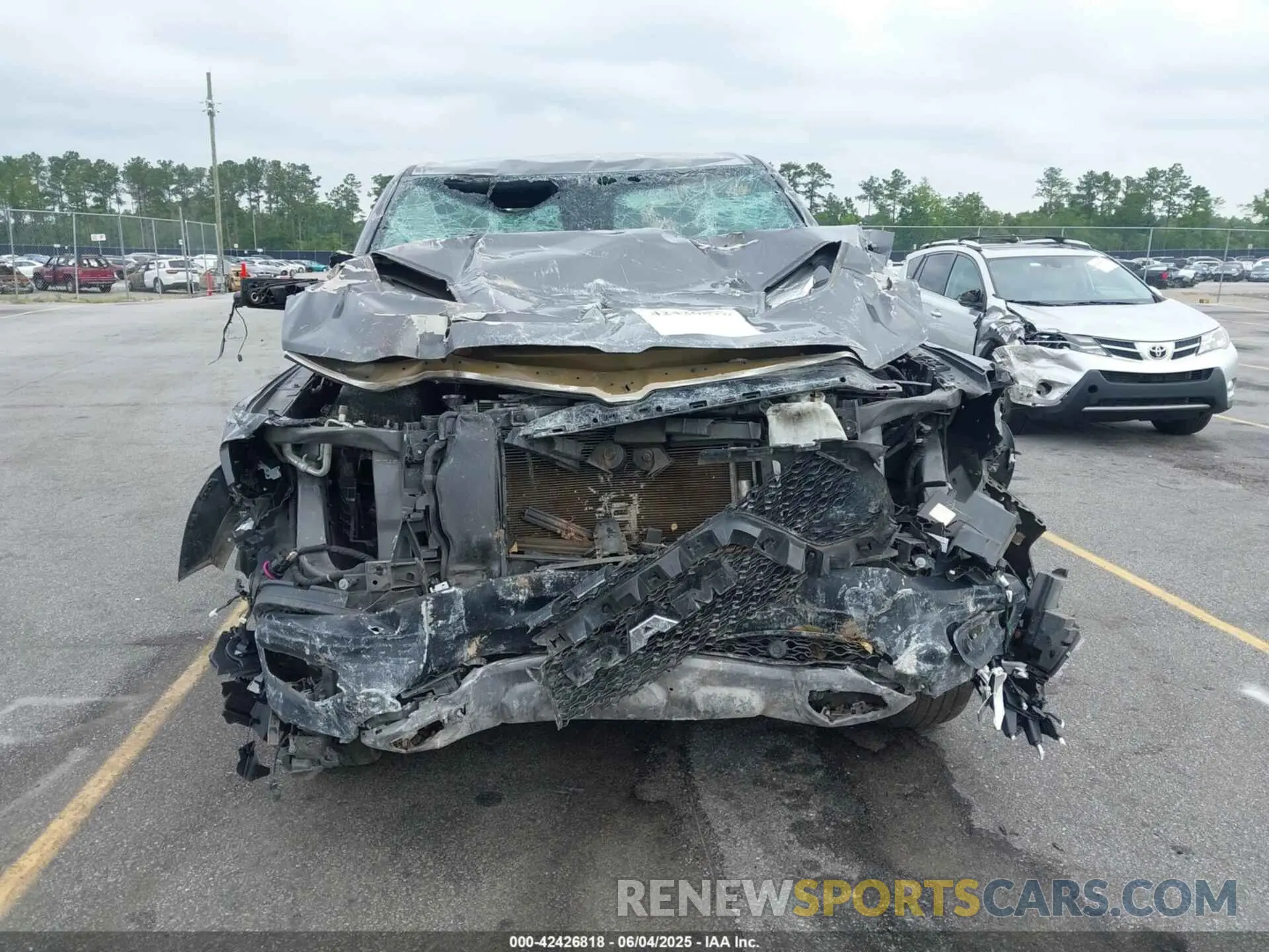 12 Photograph of a damaged car 1C6RRELT5KN625118 RAM 1500 2019